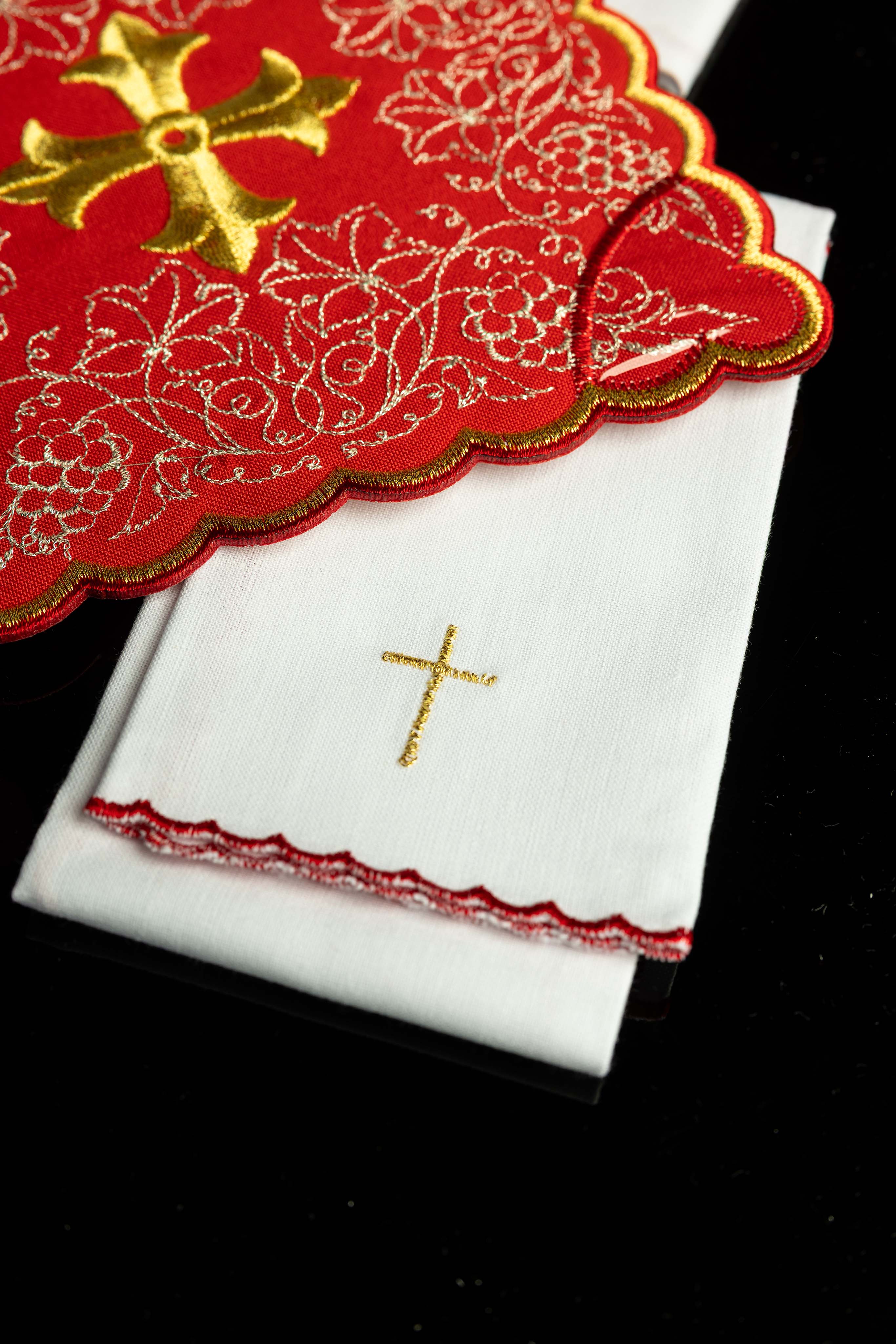 Red embroidered chalice linens set with a cross motif