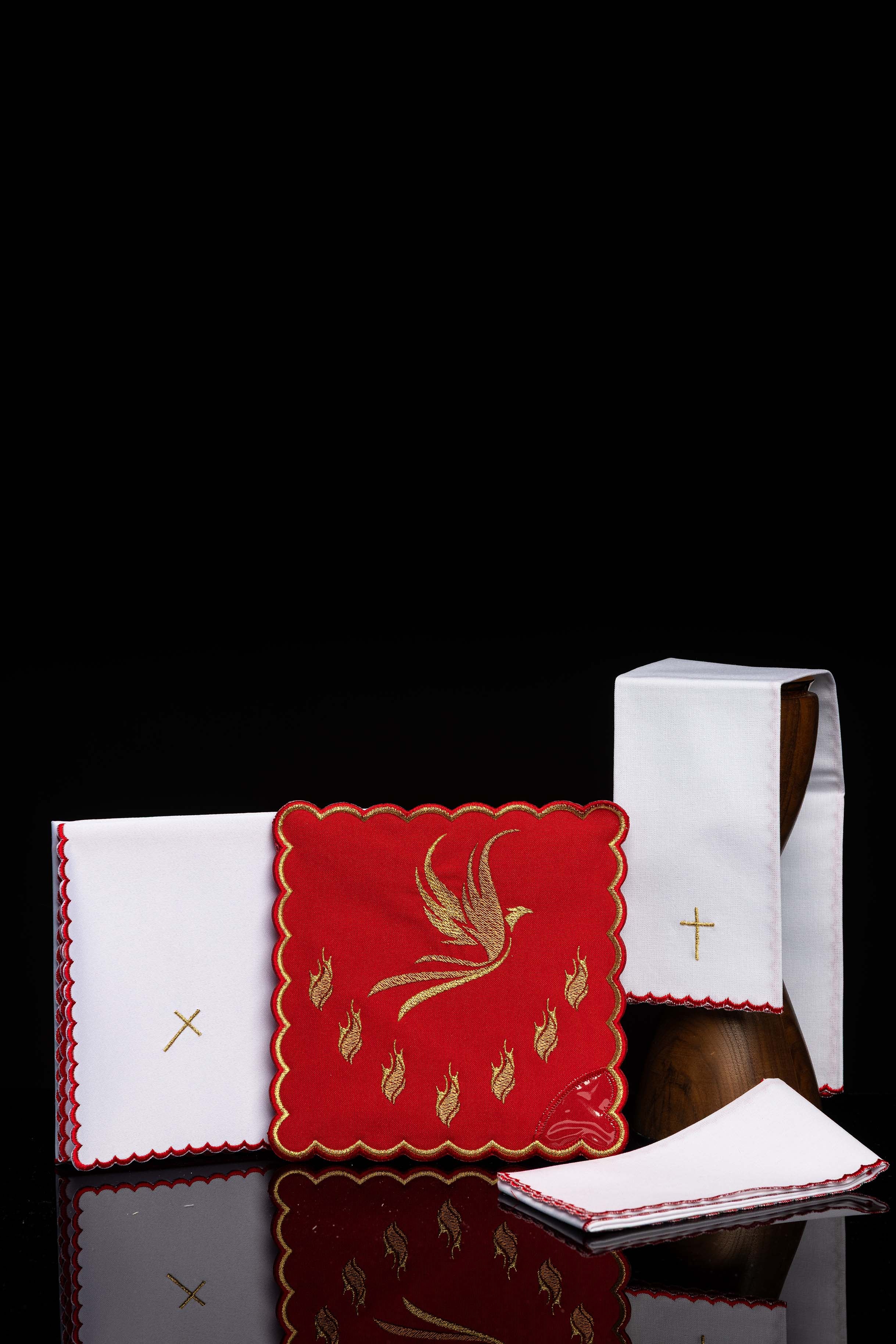 Red chalice linens set with the embroidered Holy Spirit