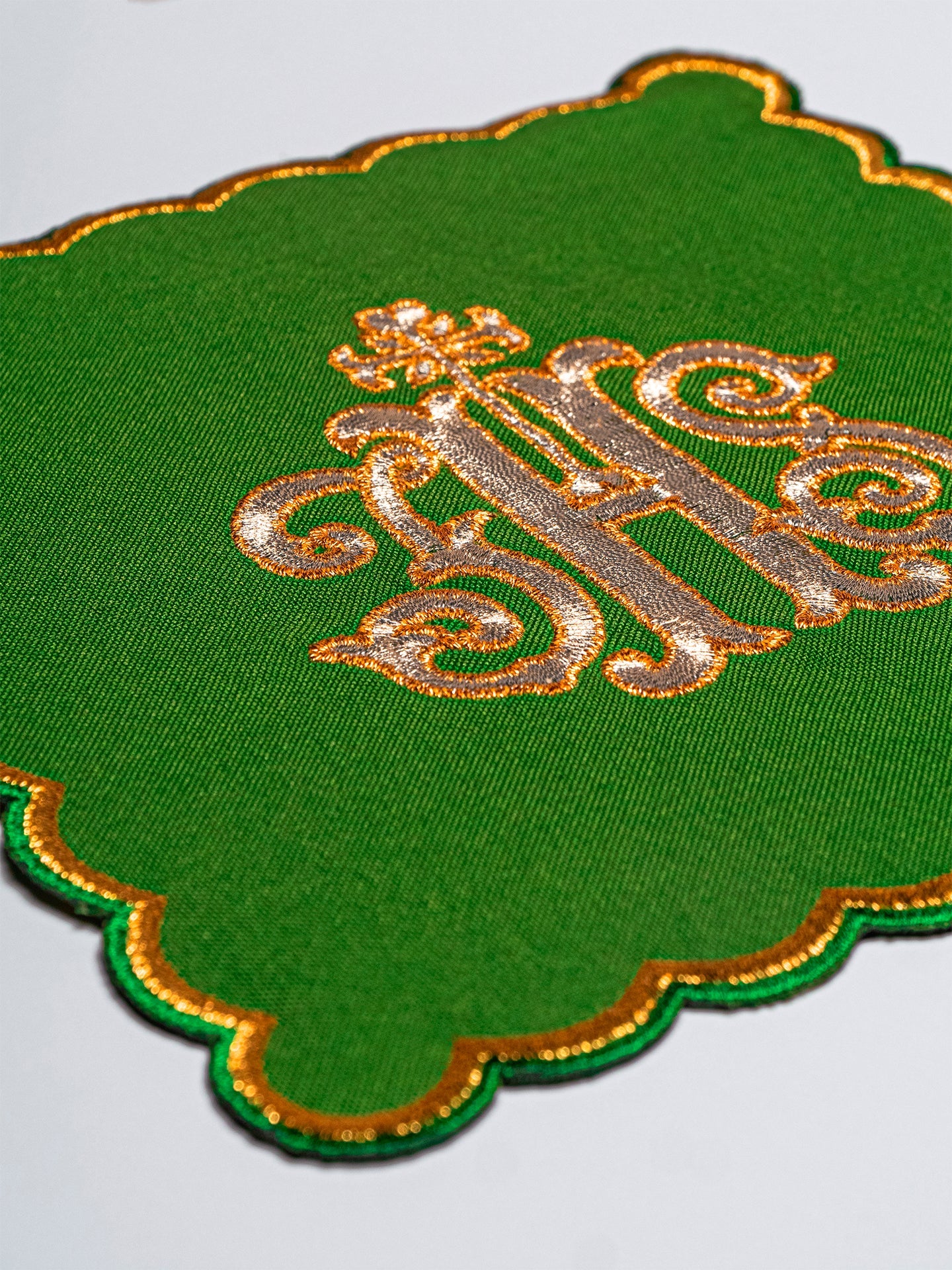 Set of palls with the IHS symbol in four liturgical colors