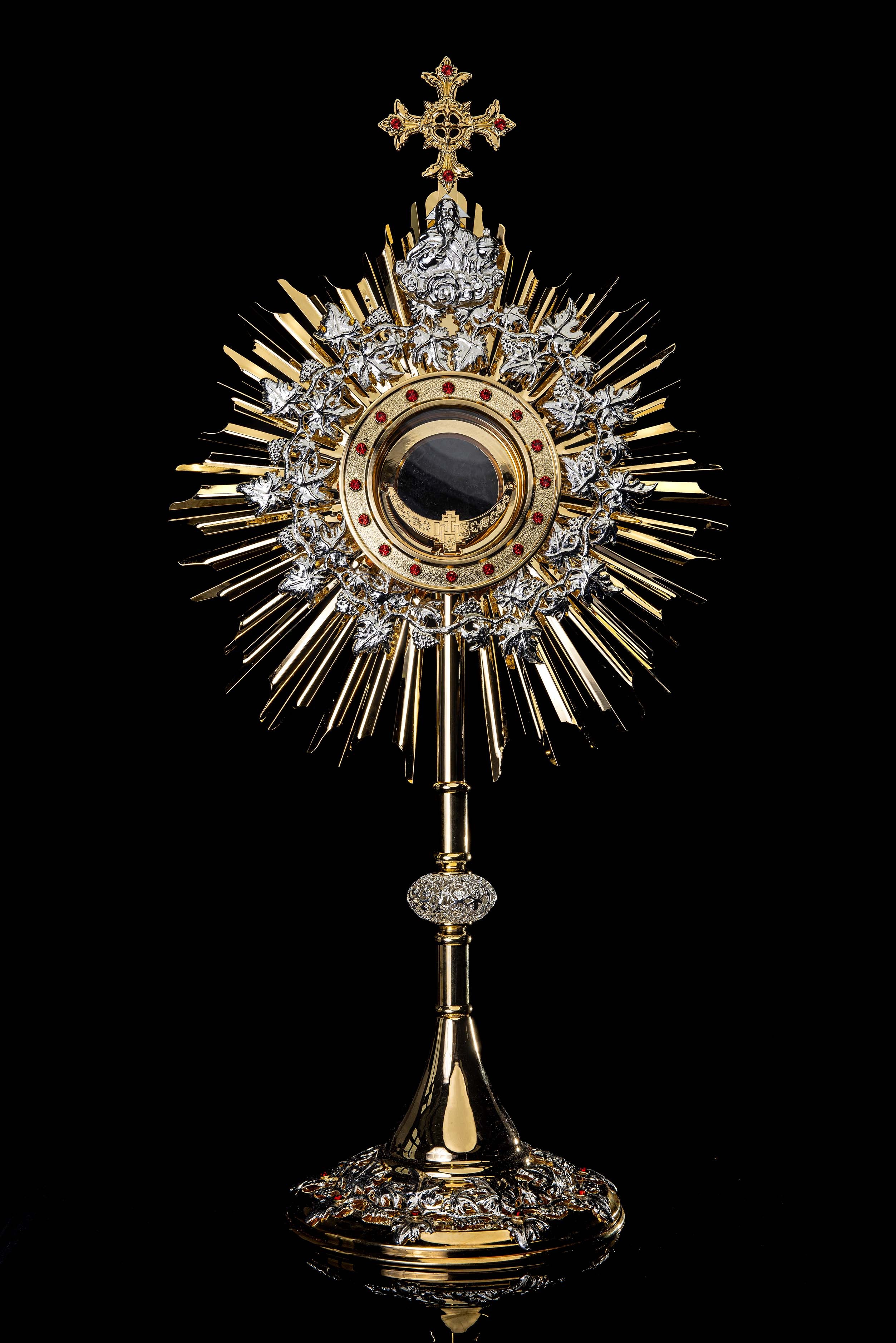 Handmade gilded brass monstrance decorated with rubies