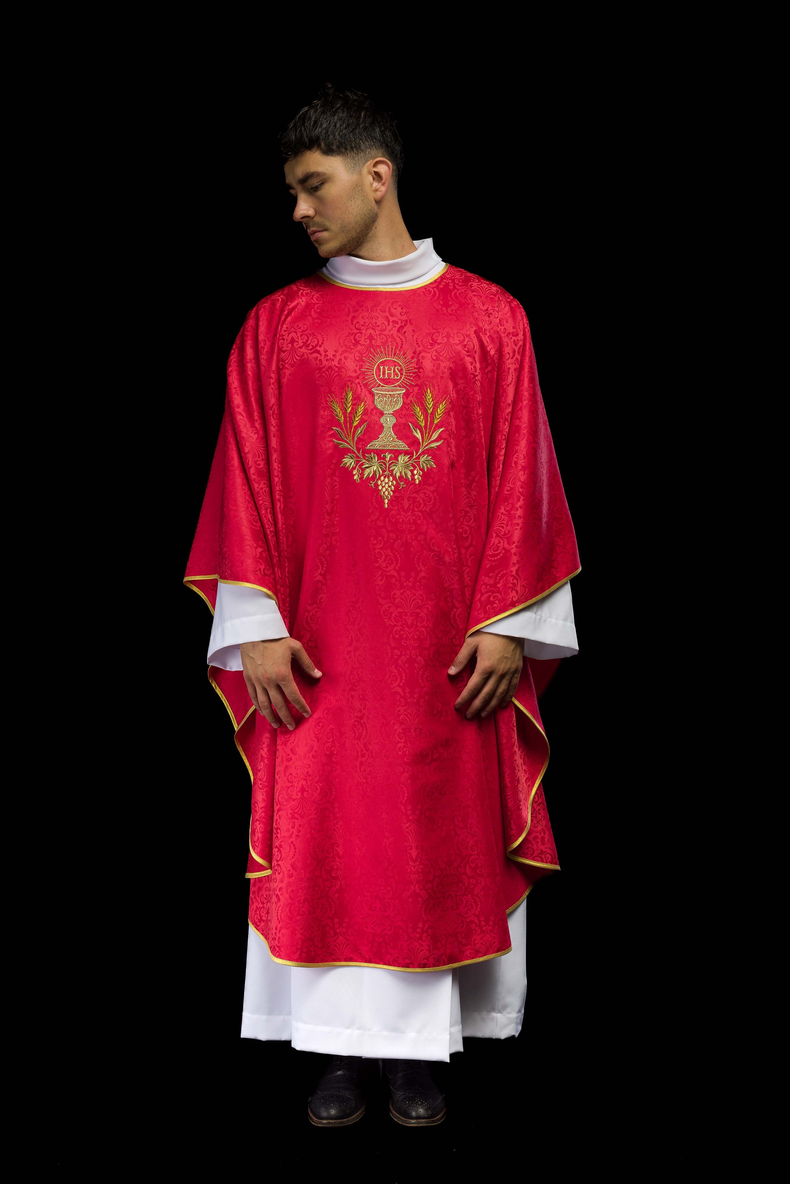 Red liturgical chasuble with embroidered chalice and host on jacquard fabric