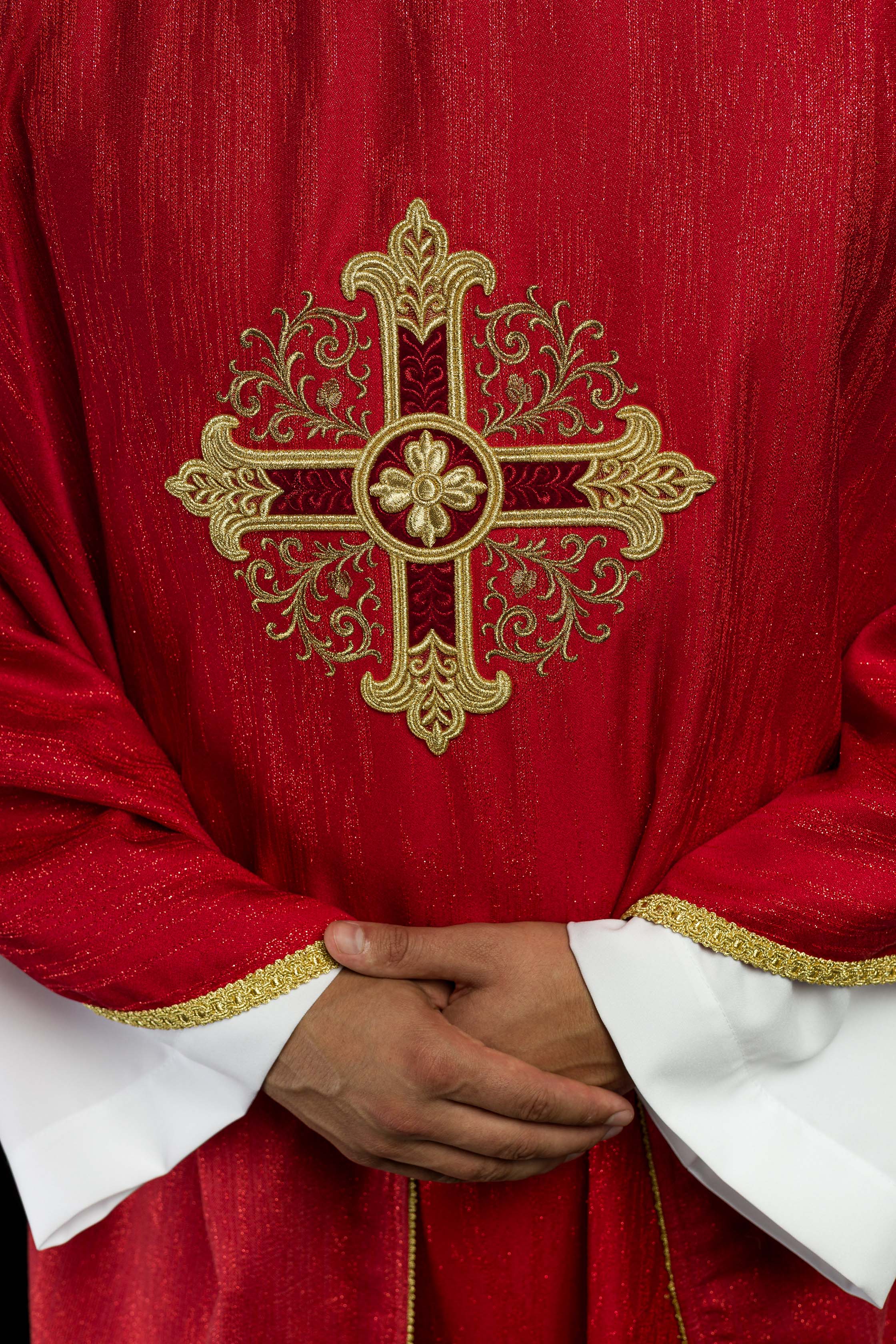 Red Liturgical Chasuble with Embroidered Cross on Decorative Fabric