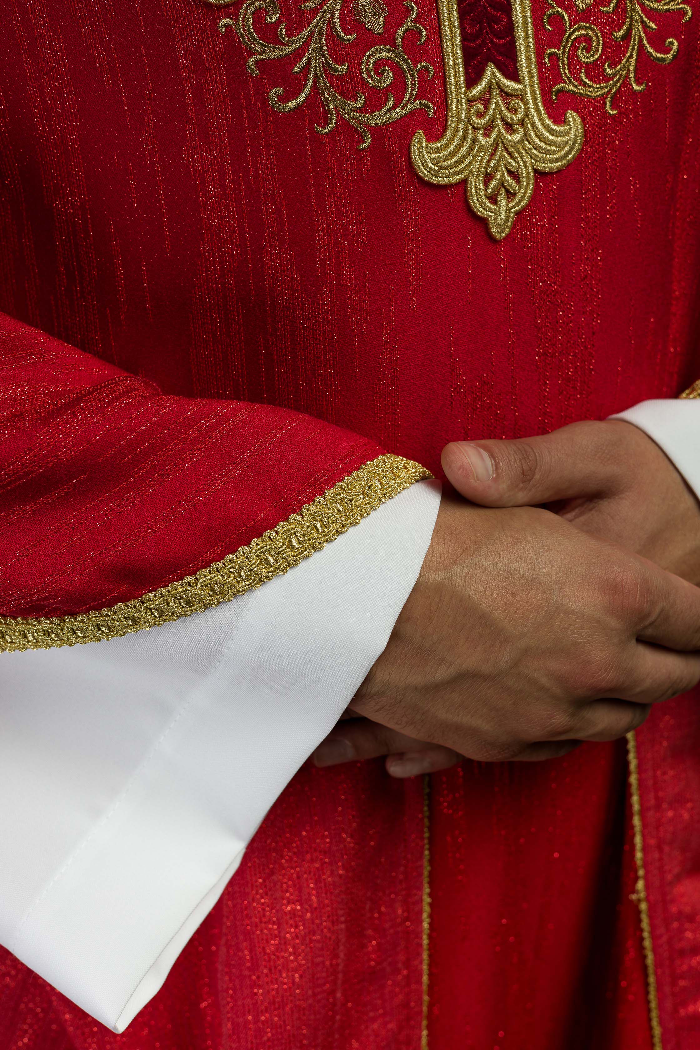 Red Liturgical Chasuble with Embroidered Cross on Decorative Fabric
