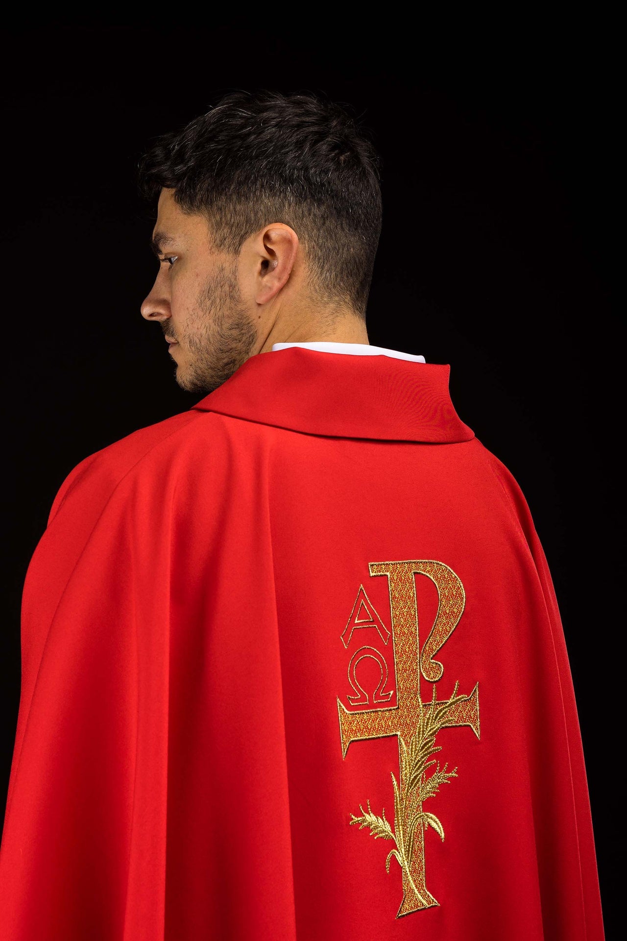 Red embroidered chasuble with Alpha and Omega symbol and wide collar