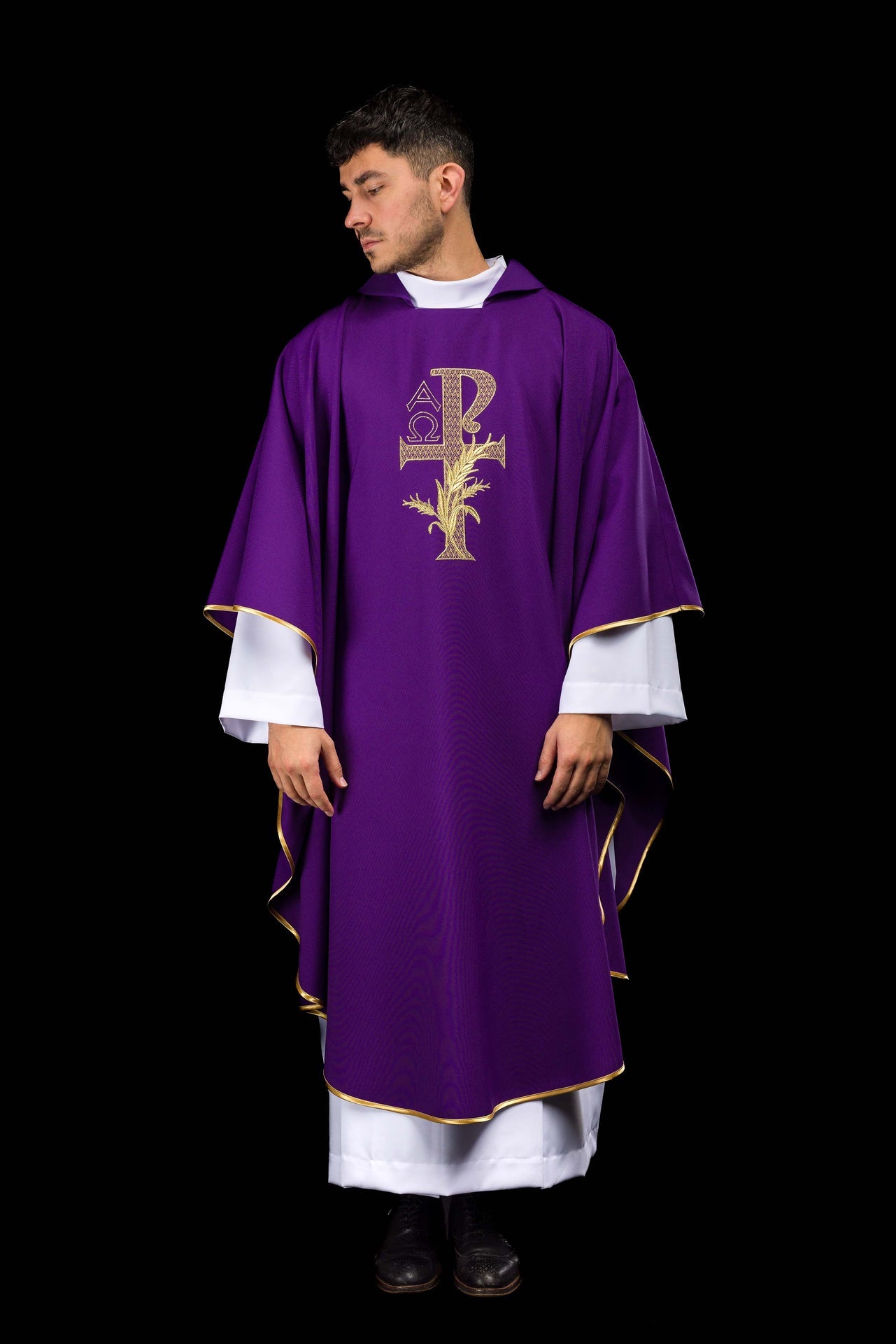 Purple embroidered chasuble with Alpha and Omega symbol and wide collar