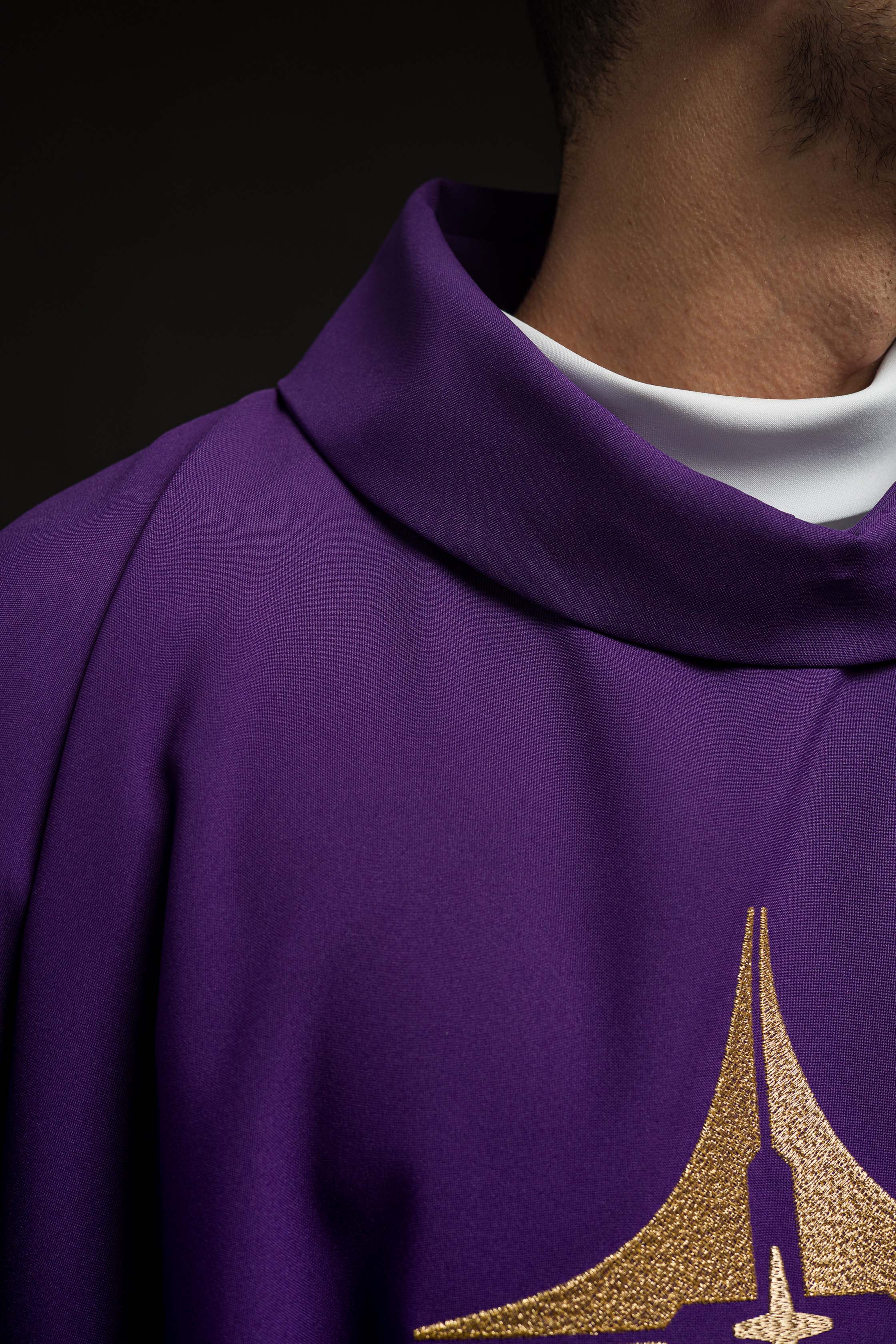 Purple chasuble embroidered with cross motif