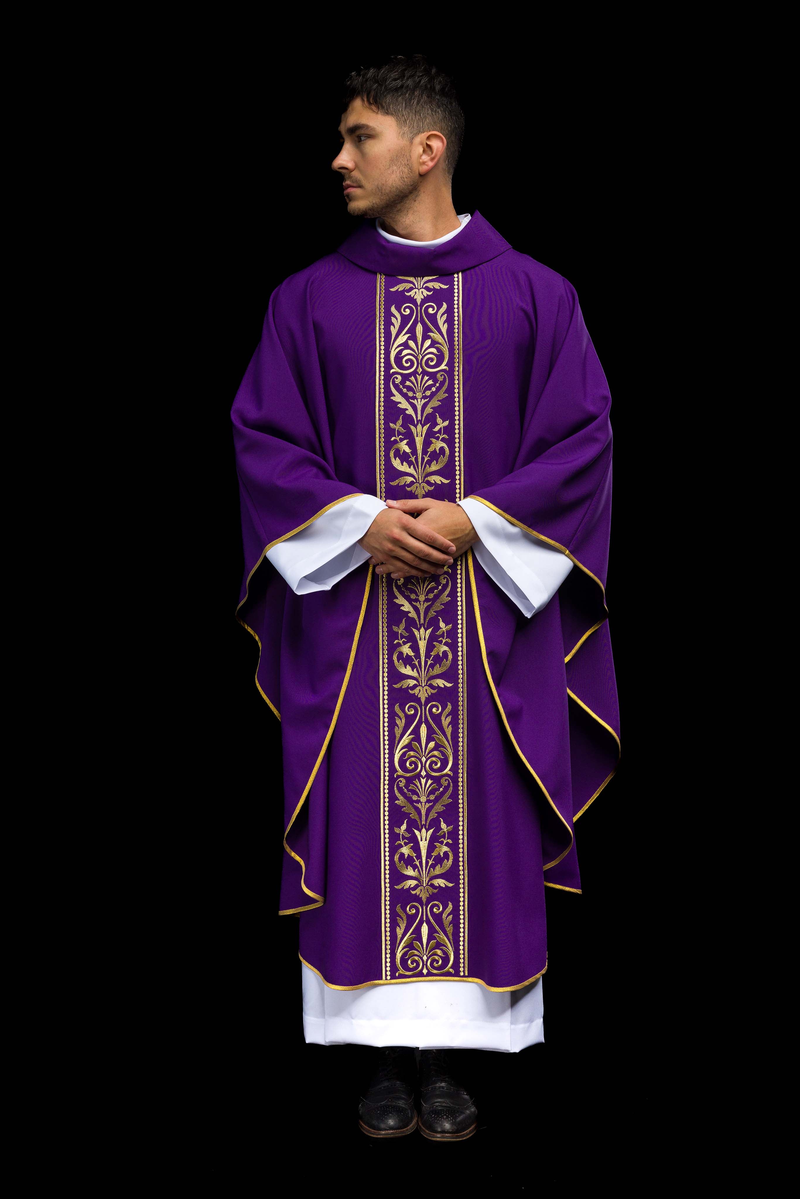Purple liturgical chasuble decorated with a gold embroidered belt