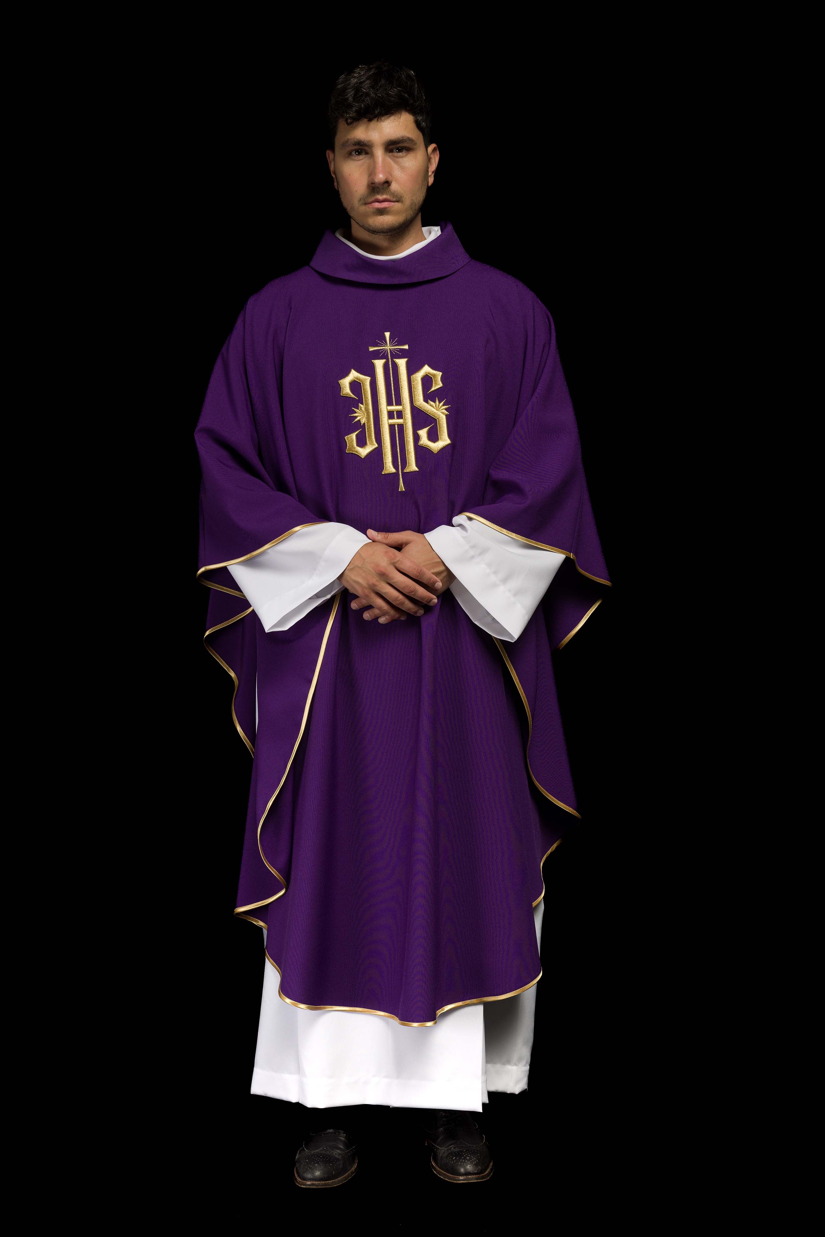Purple chasuble embroidered with IHS motif