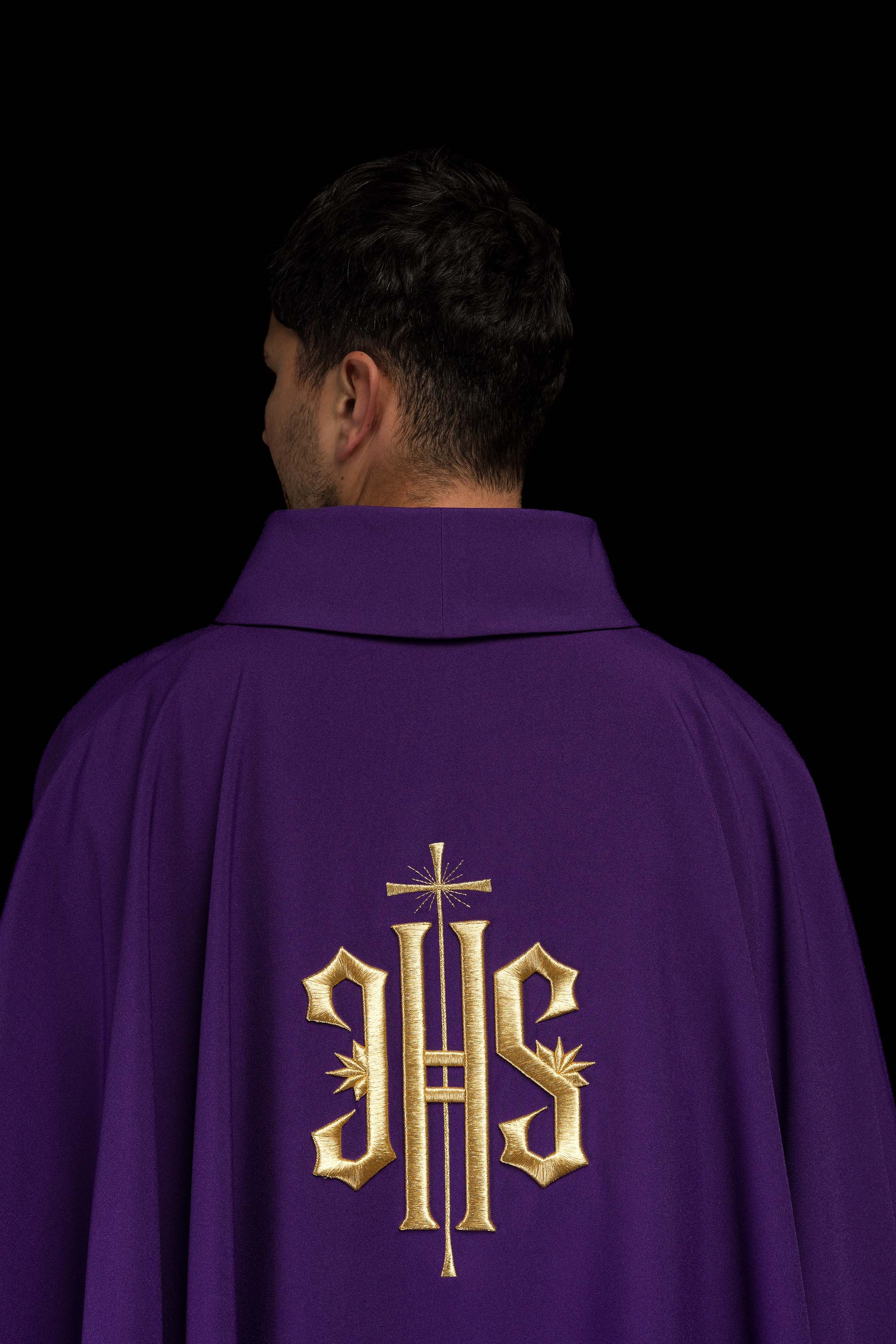 Purple chasuble embroidered with IHS motif