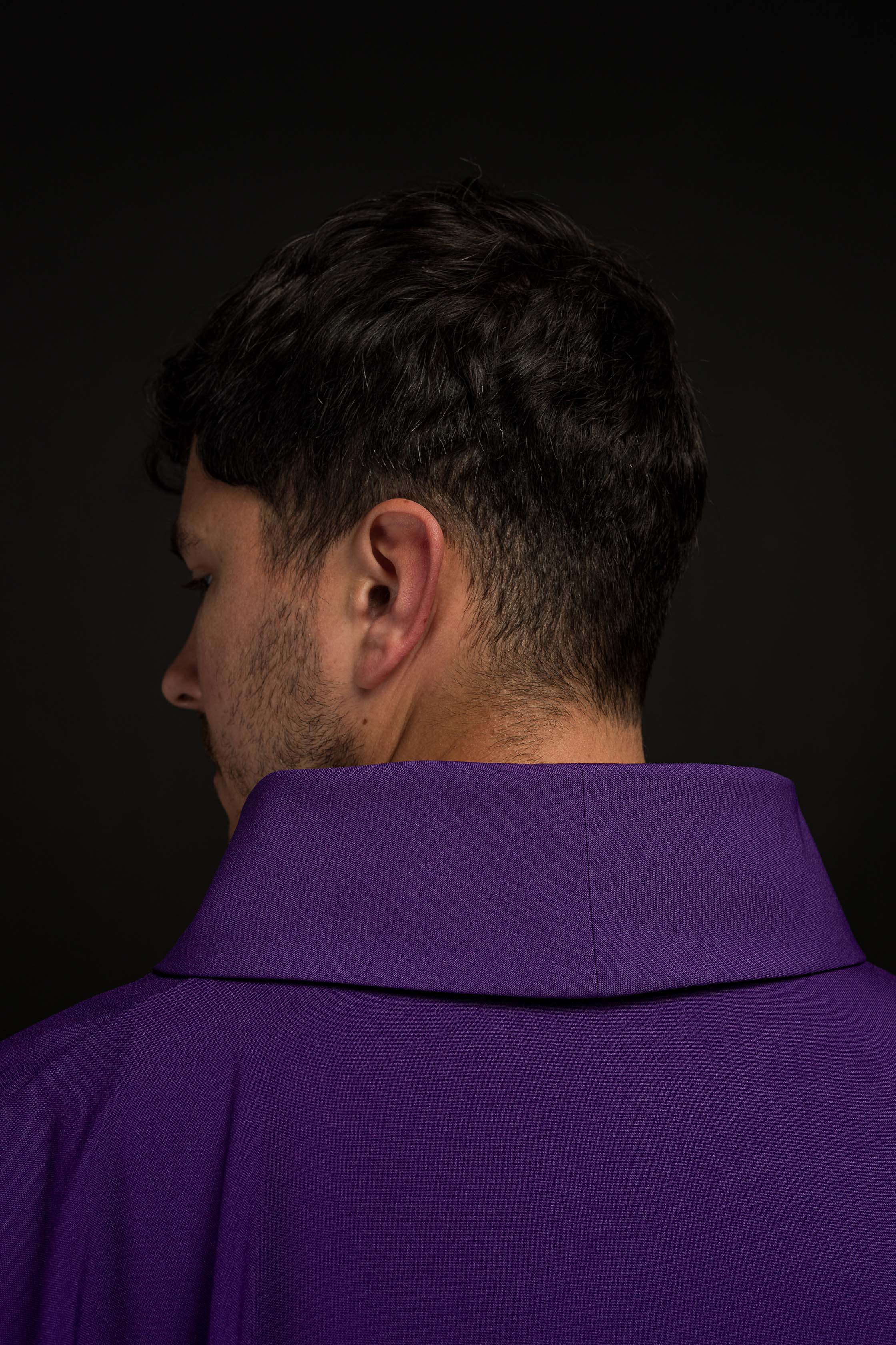 Purple chasuble embroidered with IHS motif