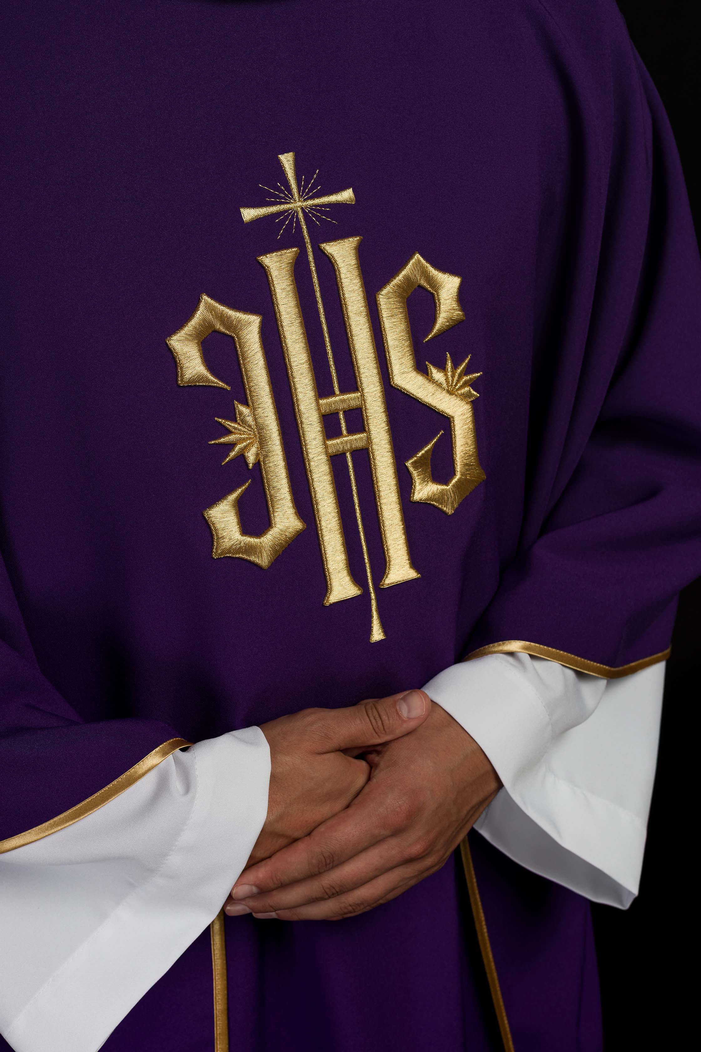 Purple chasuble embroidered with IHS motif