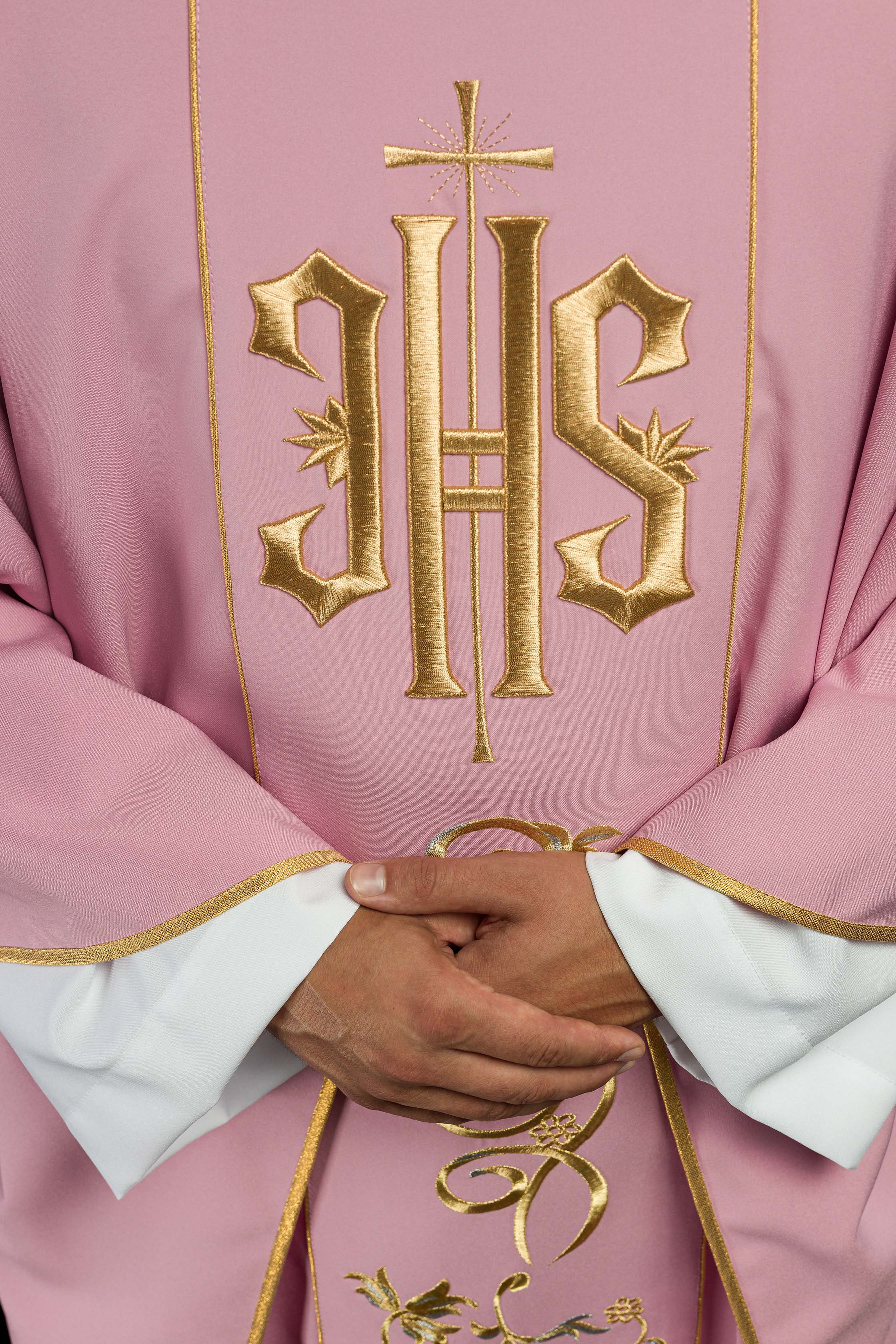 Pink chasuble with classic IHS embroidery