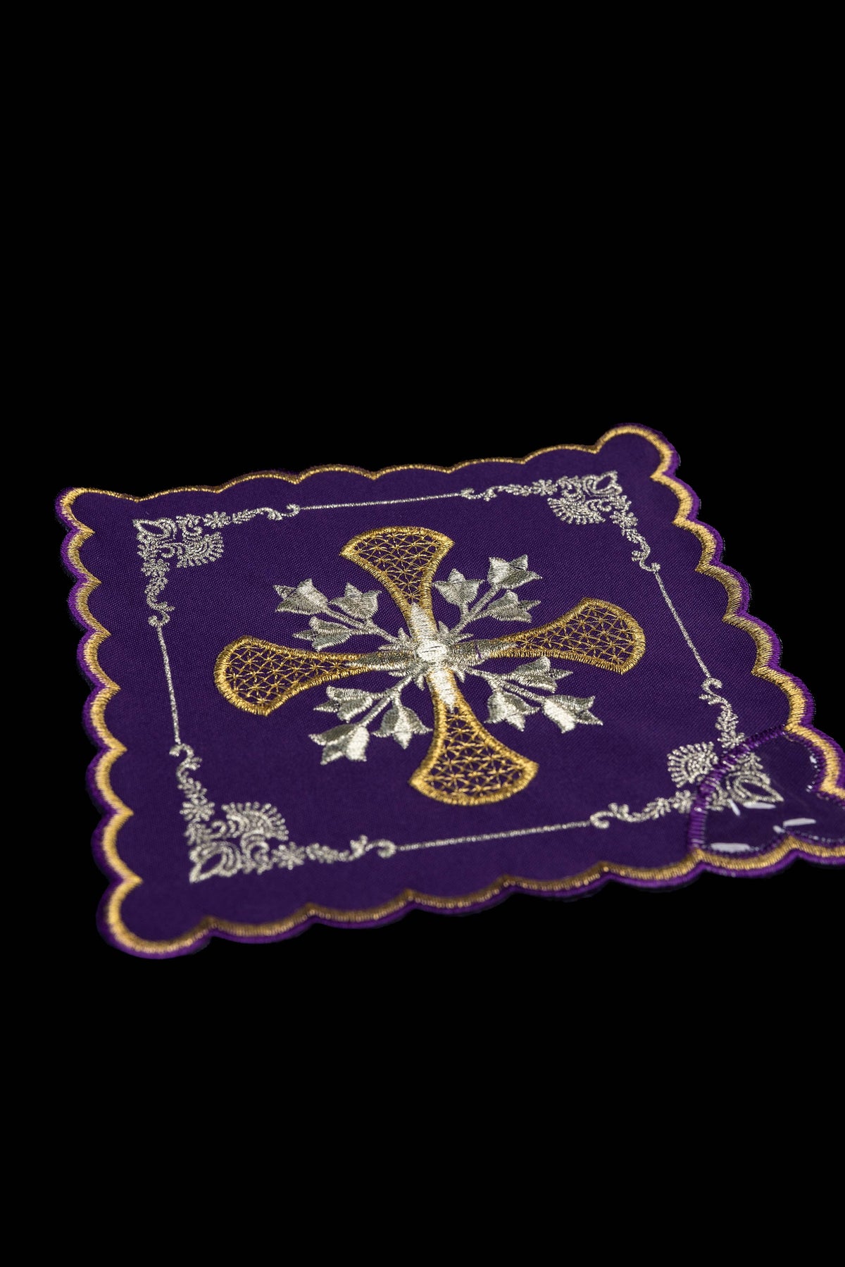 Set of chalice palls with a cross symbol in four liturgical colors