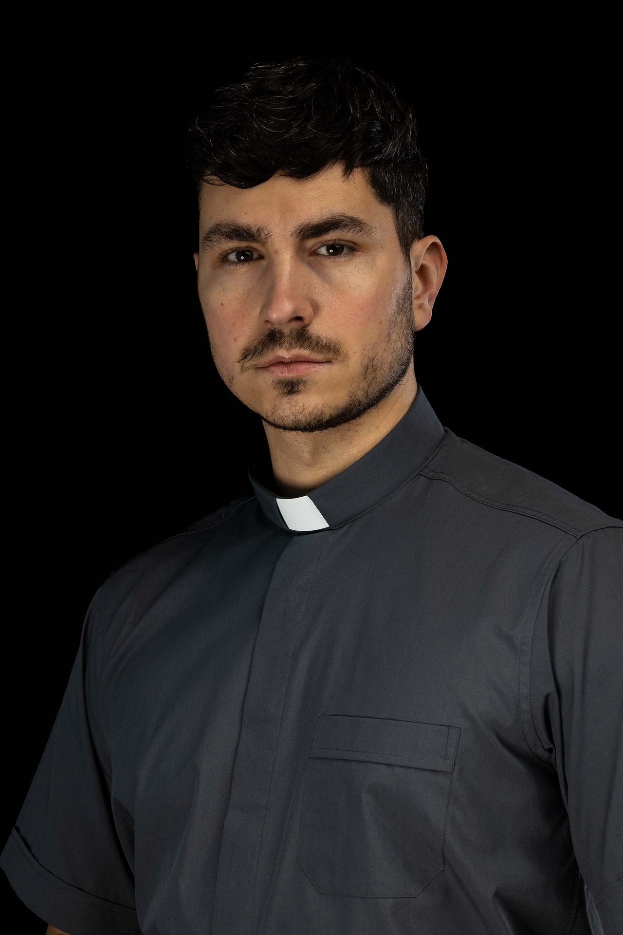 Dark grey short-sleeved clerical shirt with clerical collar