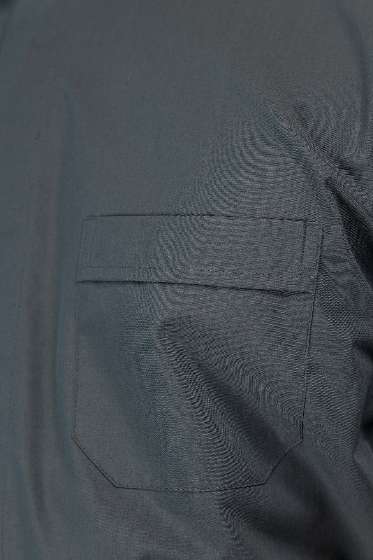 Dark grey short-sleeved clerical shirt with clerical collar
