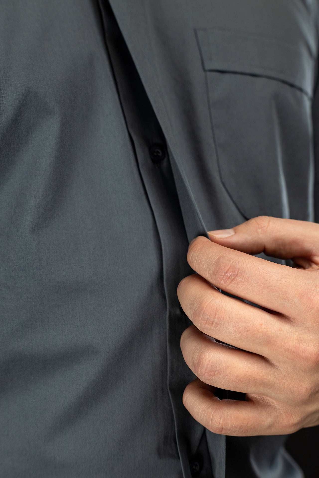 Dark grey short-sleeved clerical shirt with clerical collar