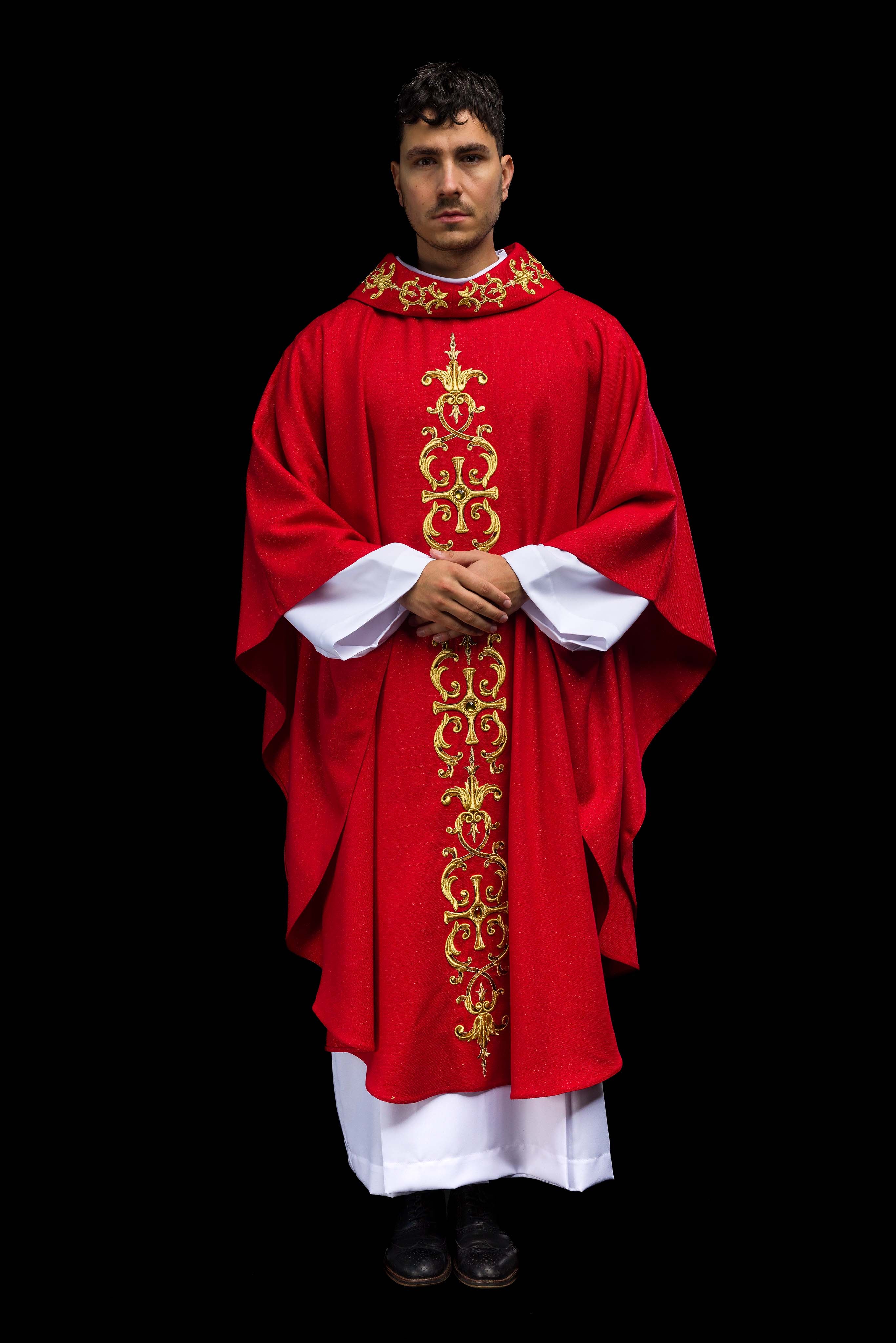 Red chasuble richly embroidered with gemstones
