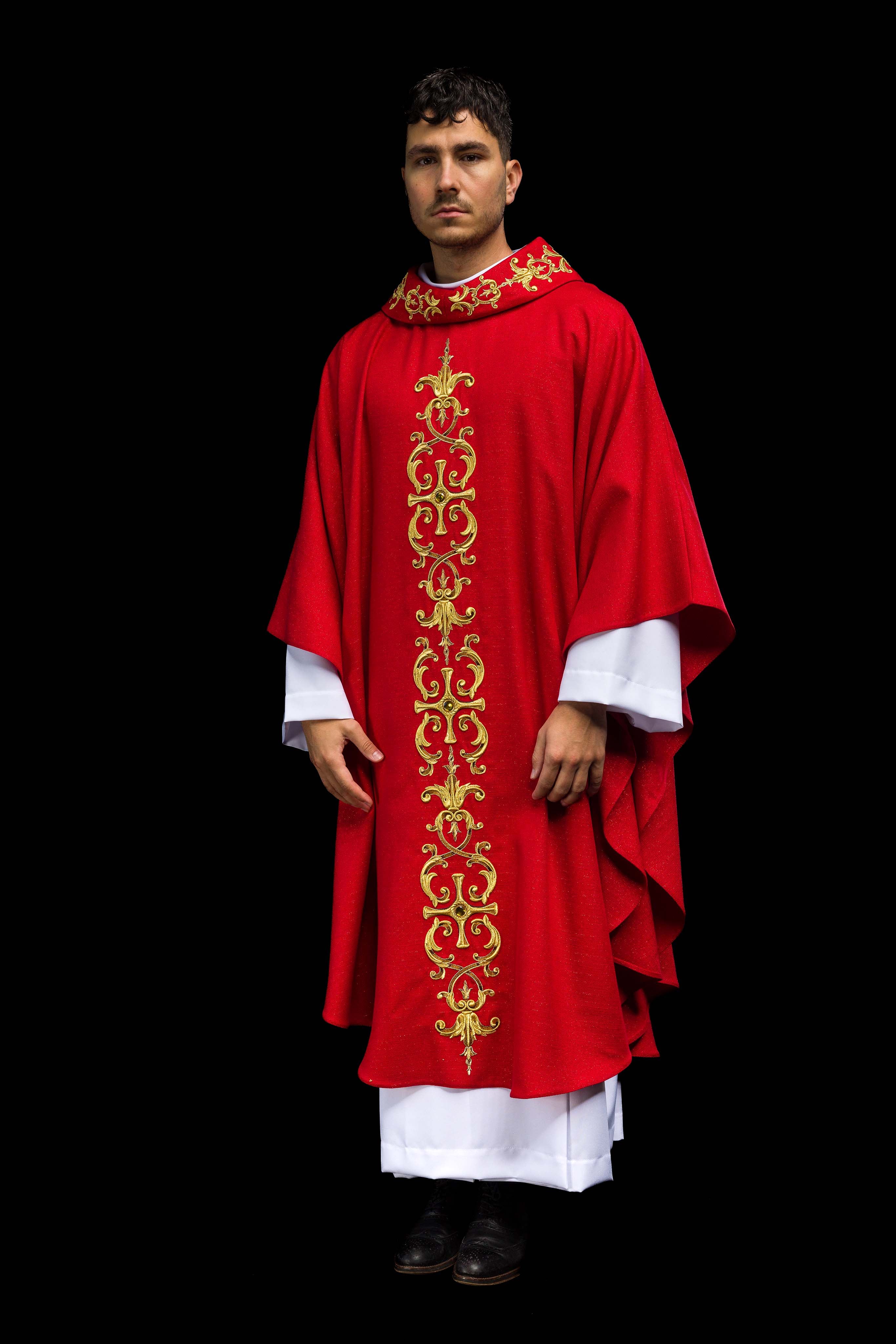 Red chasuble richly embroidered with gemstones