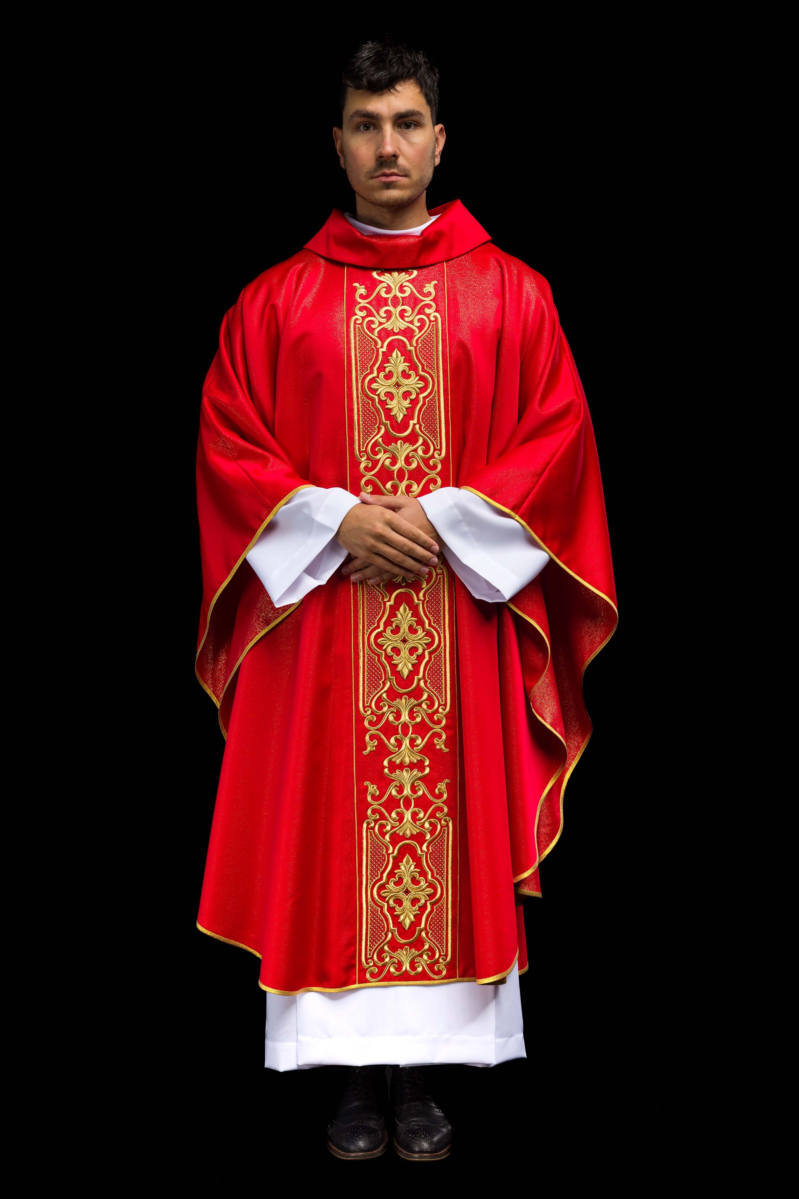 Red chasuble on shiny fabric