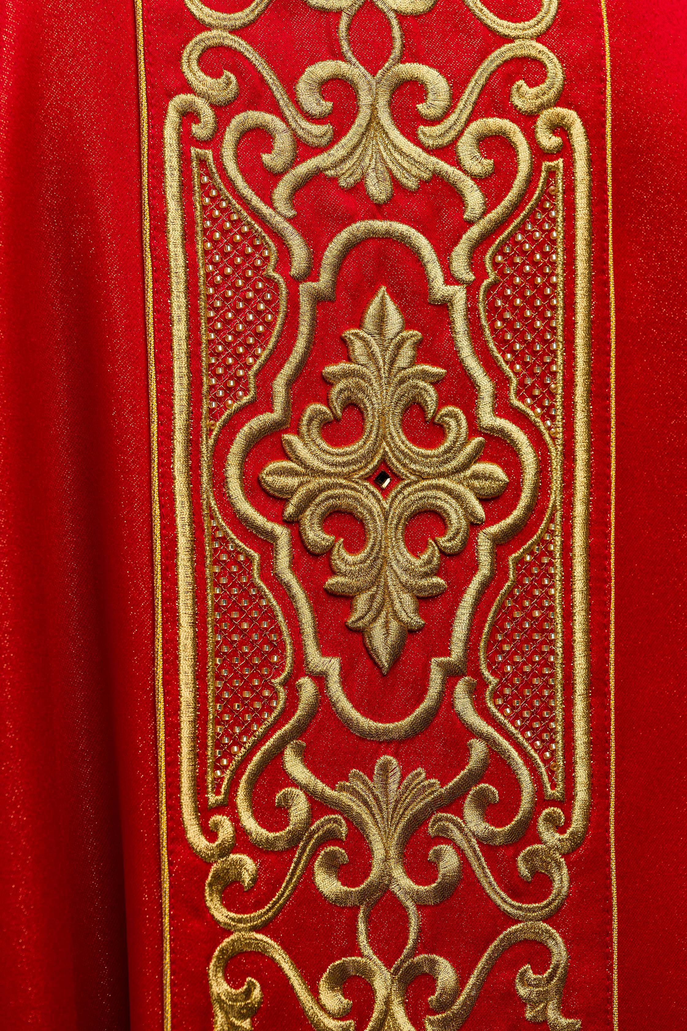 Red chasuble on shiny fabric