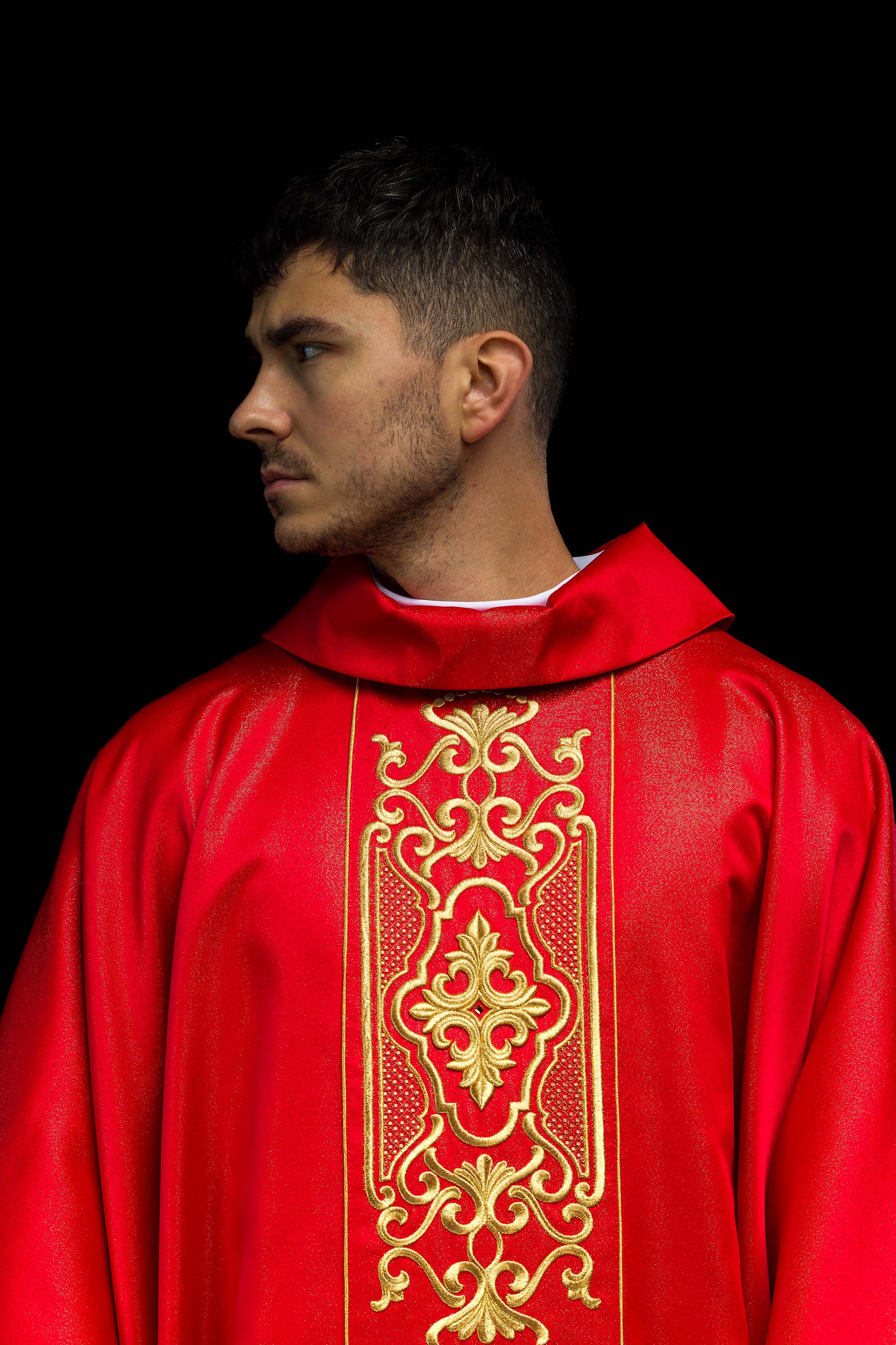 Red chasuble on shiny fabric