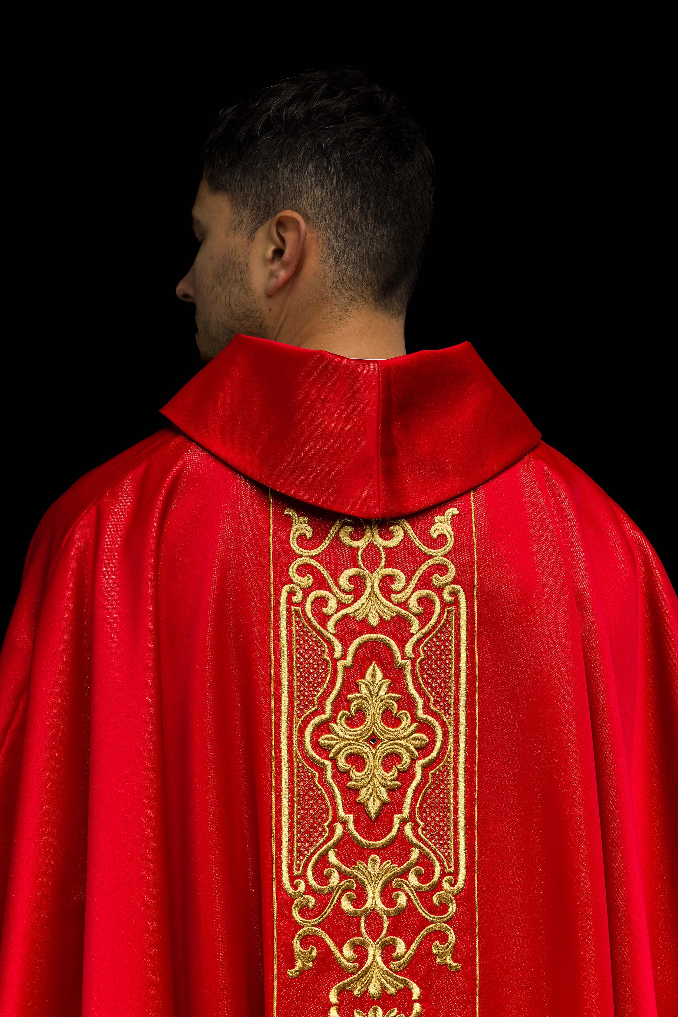 Red chasuble on shiny fabric
