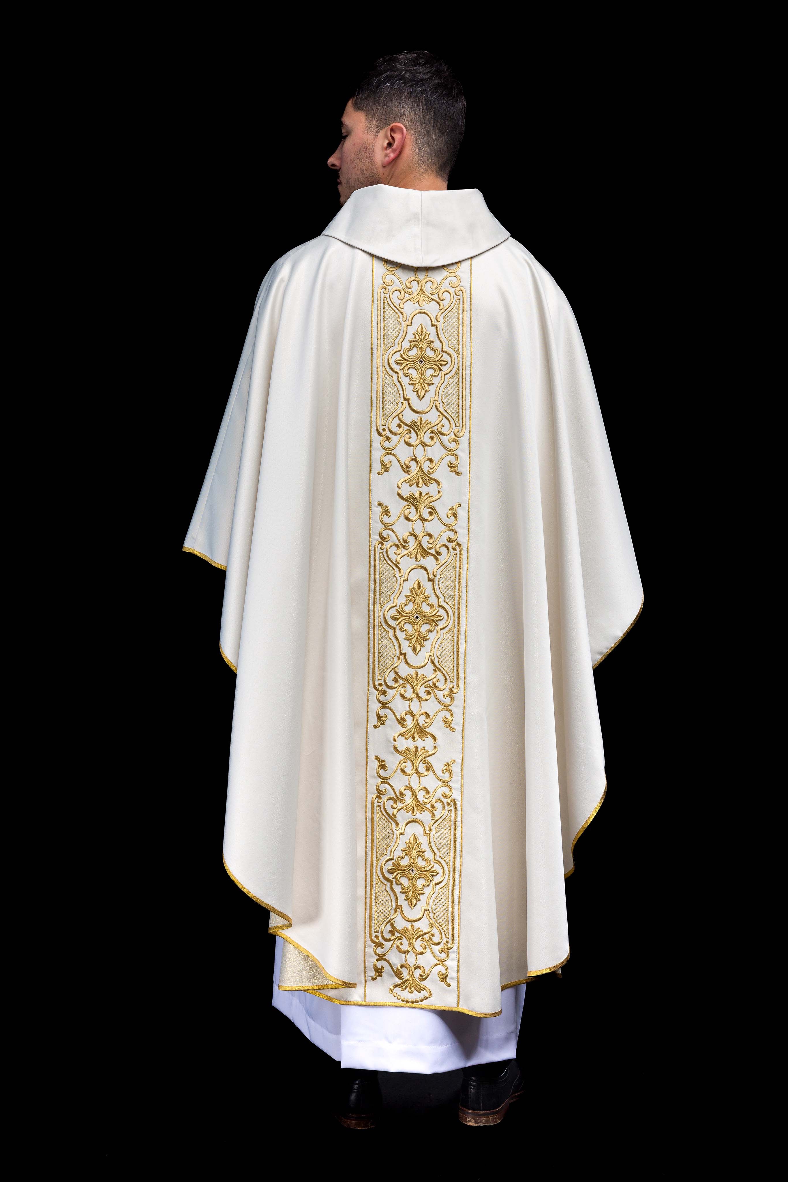 Chasuble made of shiny fabric with rich gold embroidery at the waist