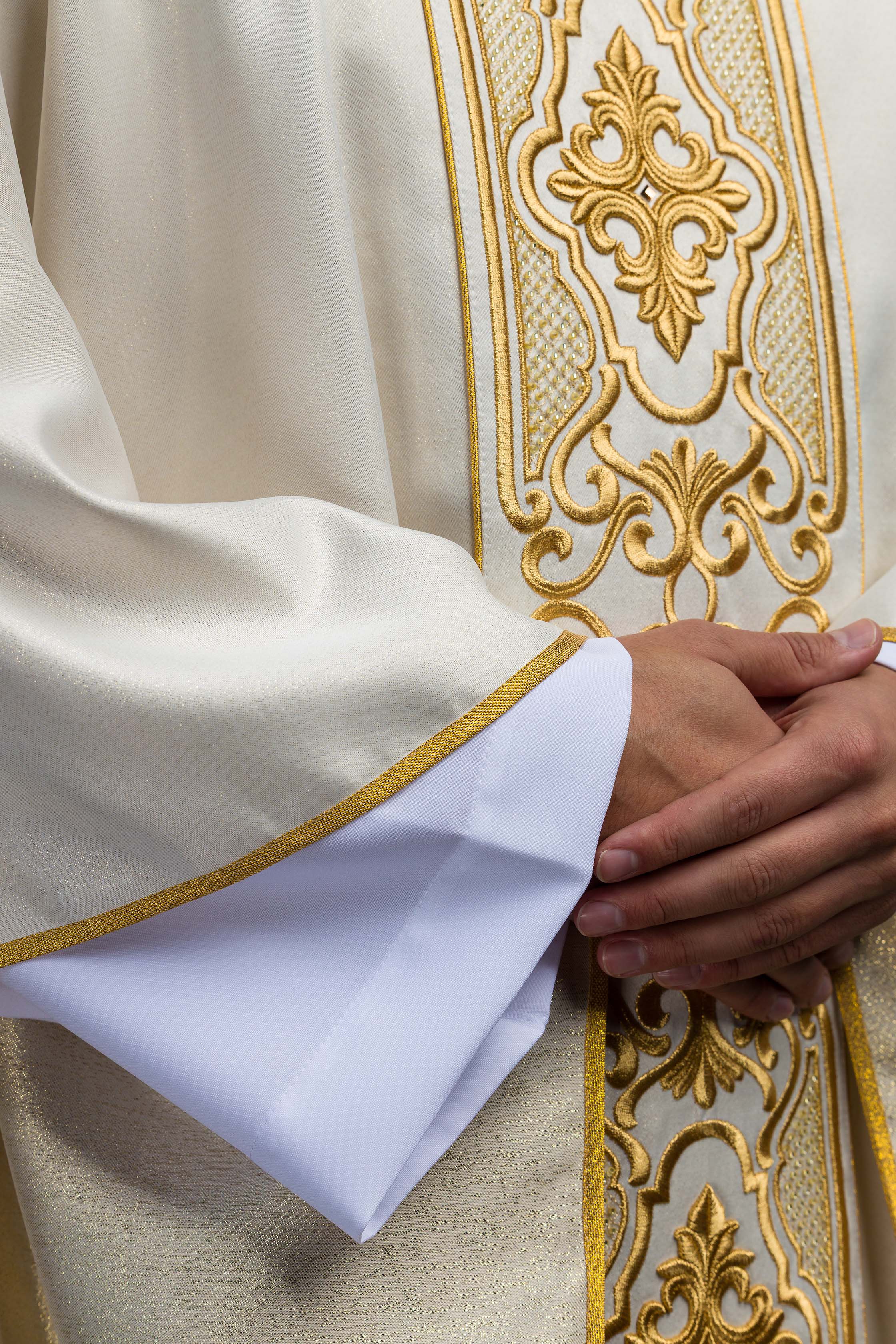 Chasuble made of shiny fabric with rich gold embroidery at the waist