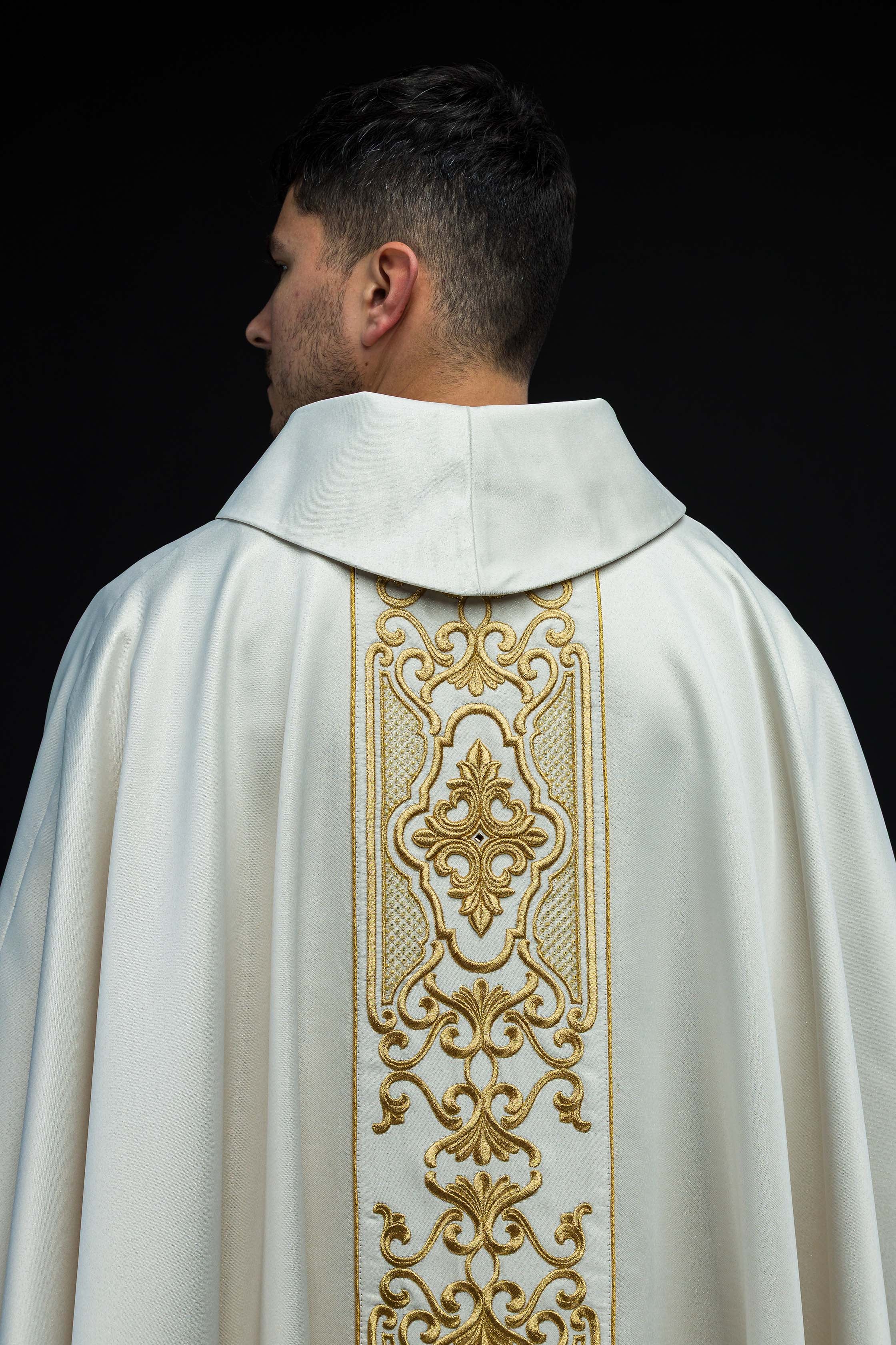 Chasuble made of shiny fabric with rich gold embroidery at the waist