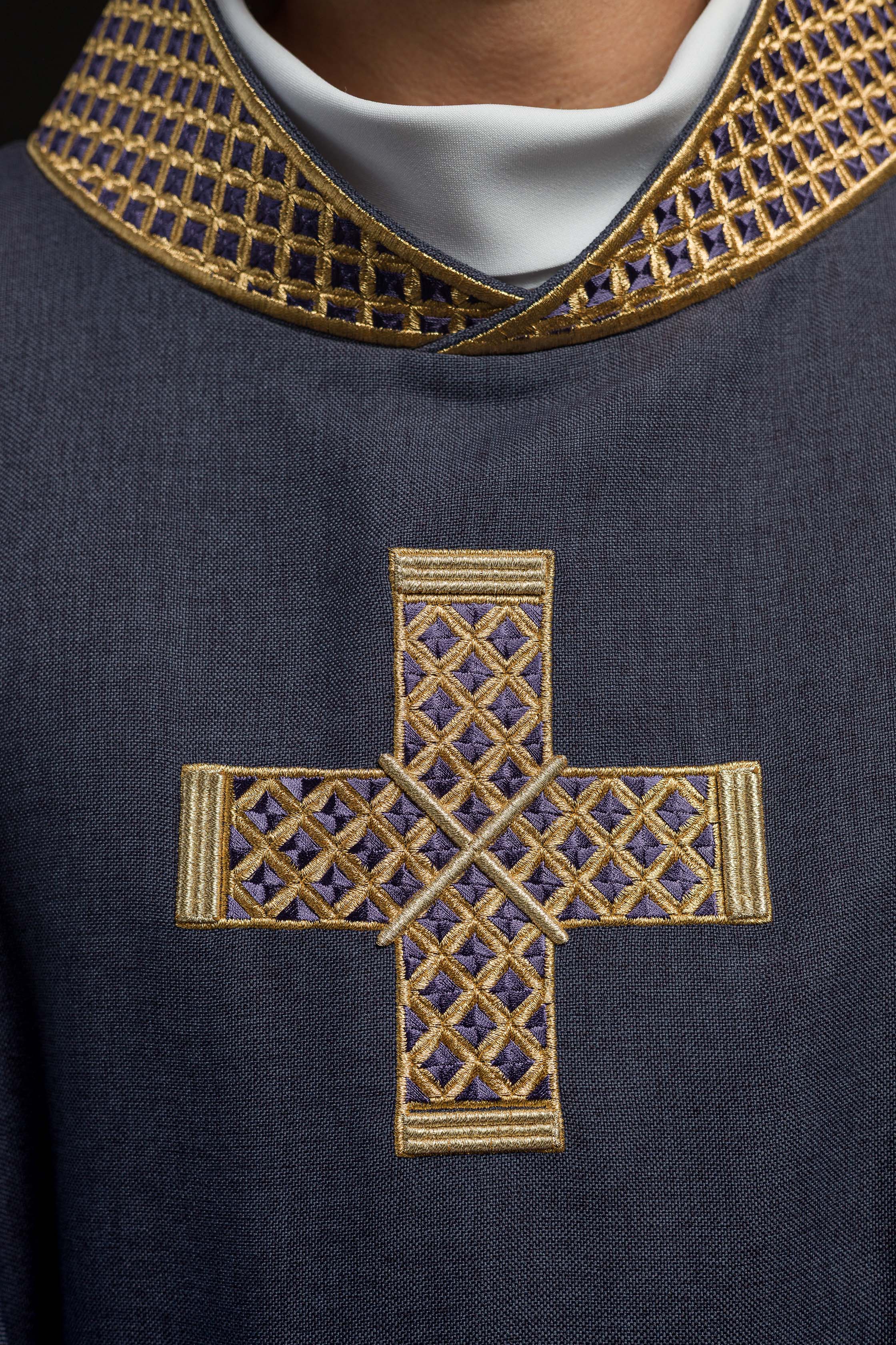 Dark purple chasuble with embroidered crosses