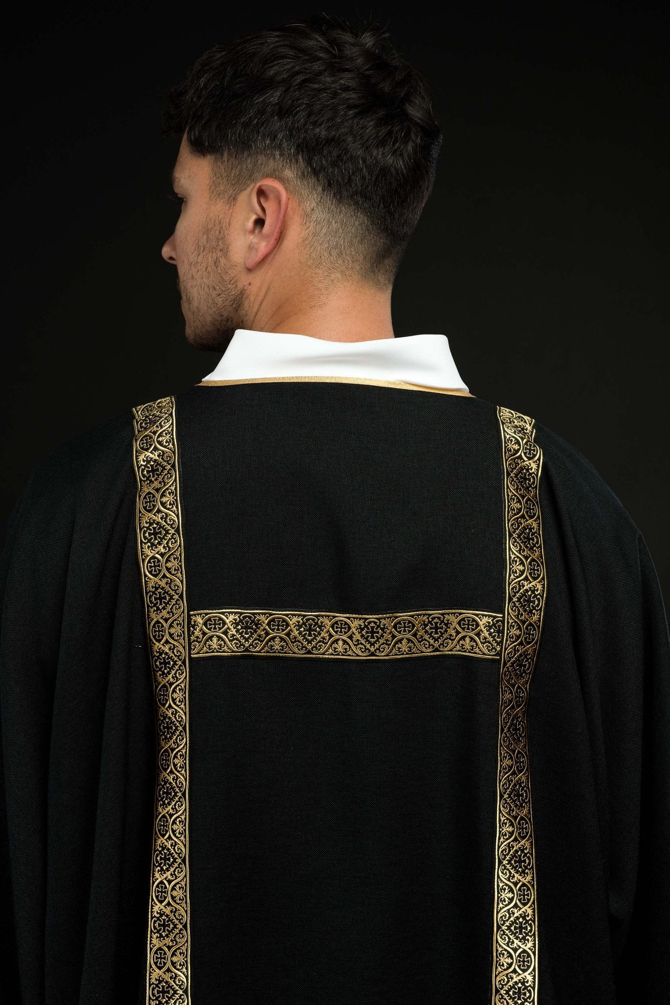 Black dalmatic decorated with gold jacquard ribbons KDL/395/07/70/B - CHASUBLES.COM