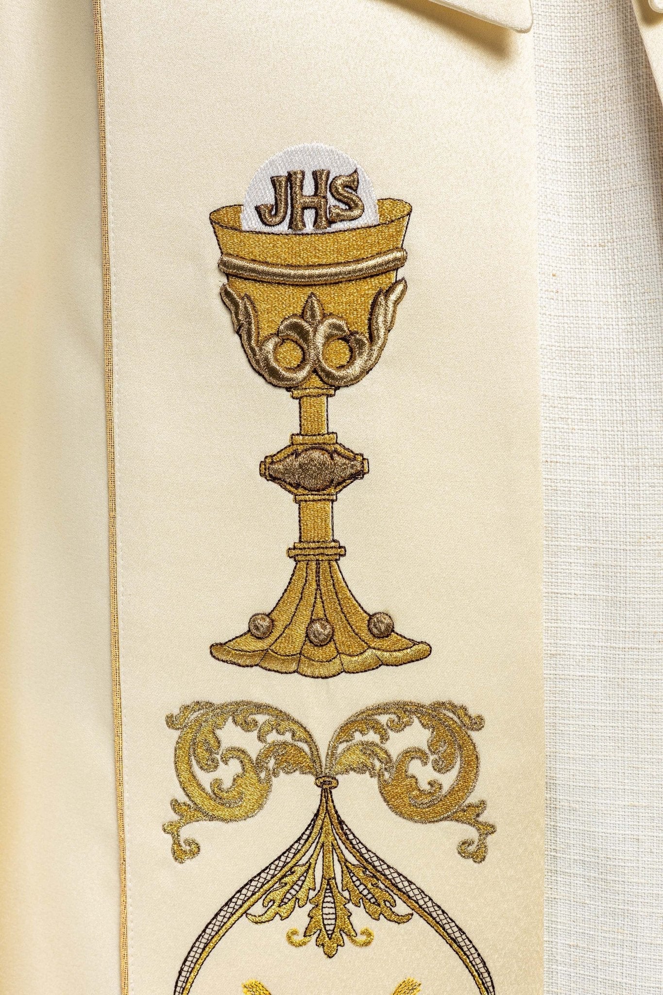 Clerical cope with embroidered gold IHS motif KKP/006/05 ECRU SAT.POMPON 145cm - HAFTINAUSA.COM