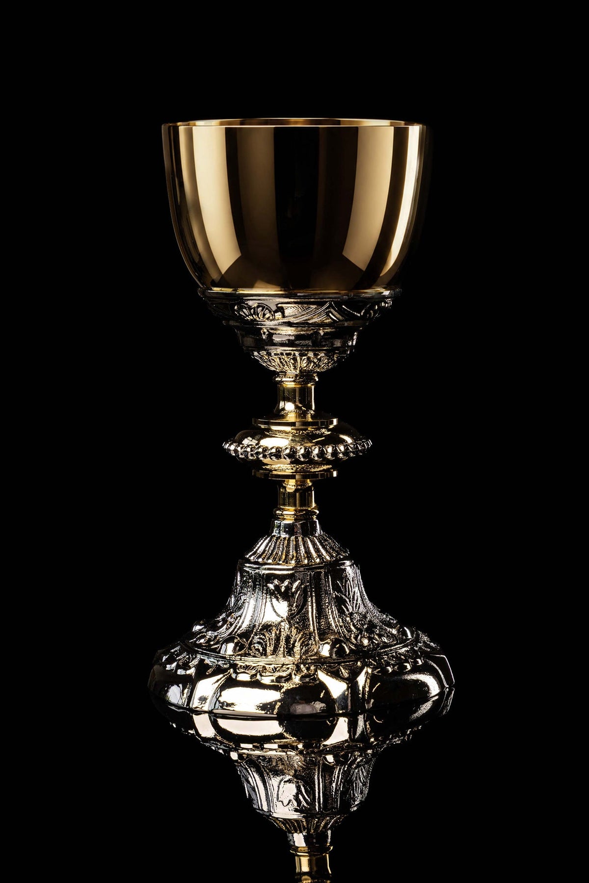 Front view of a Baroque-Style Chalice Finished with Gold and Silver Plating with ornate relief