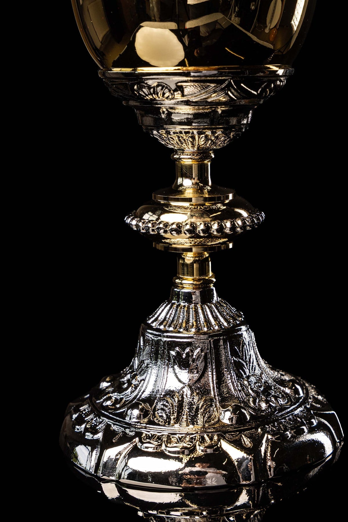 Close-up of the plated chalice showing the ornate stem and raised base details