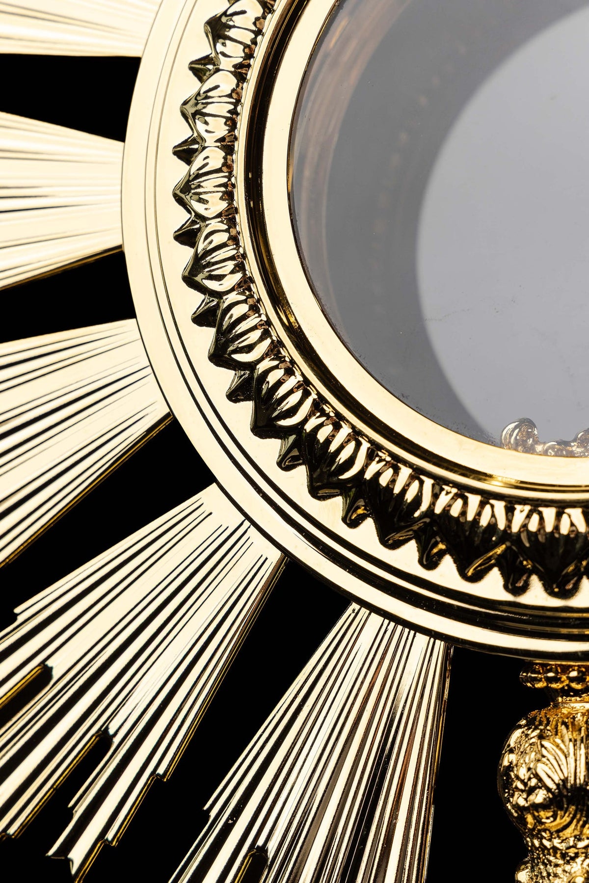 Close-up of the monstrance showing overlapping gold-plated radiant rays
