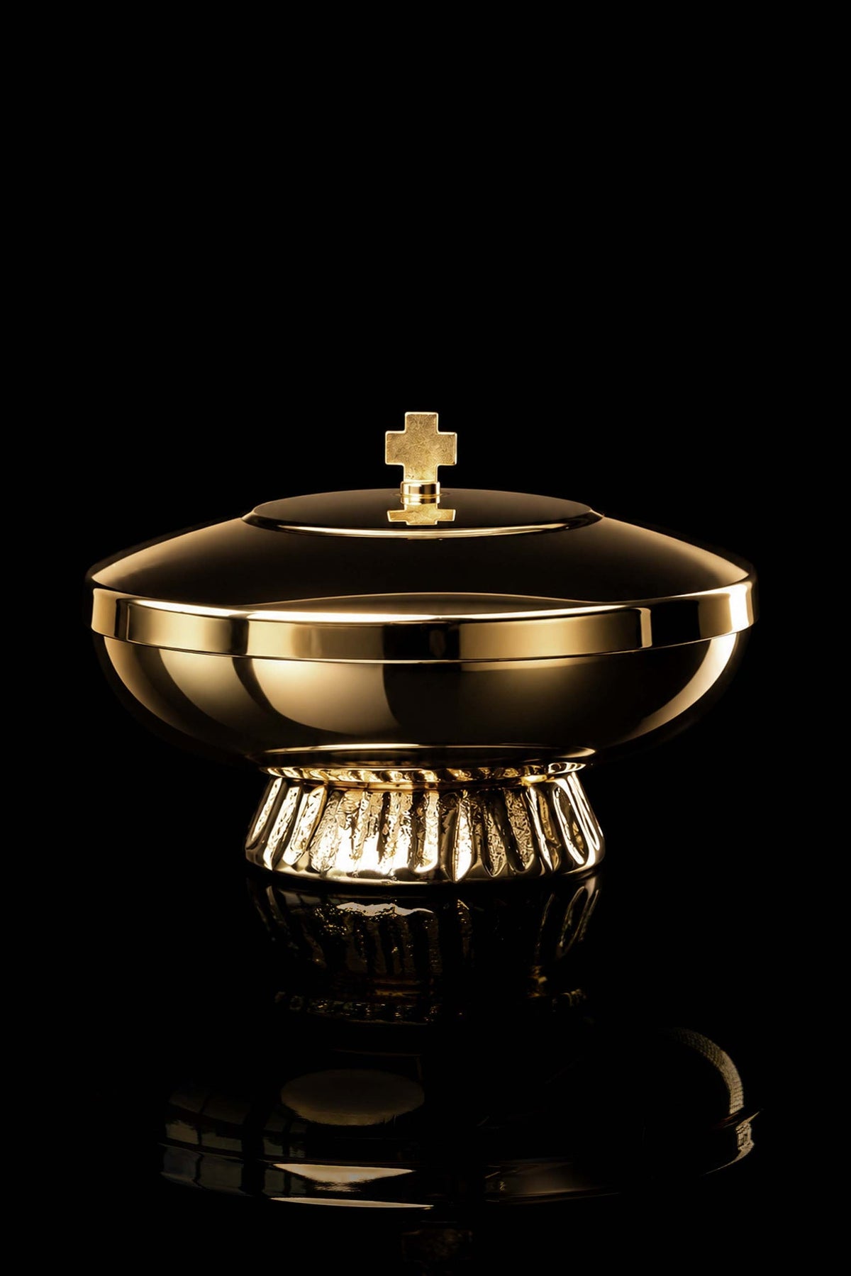 Front view of the gold-plated brass ciborium with cross finial and fluted pedestal base