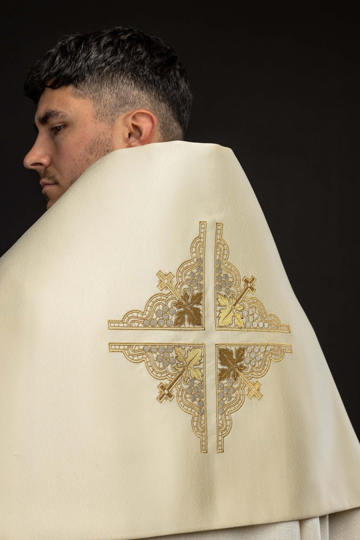 Back close-up of an Ecru Humeral Veil with Embroidered Cross showing the ornate gold cross