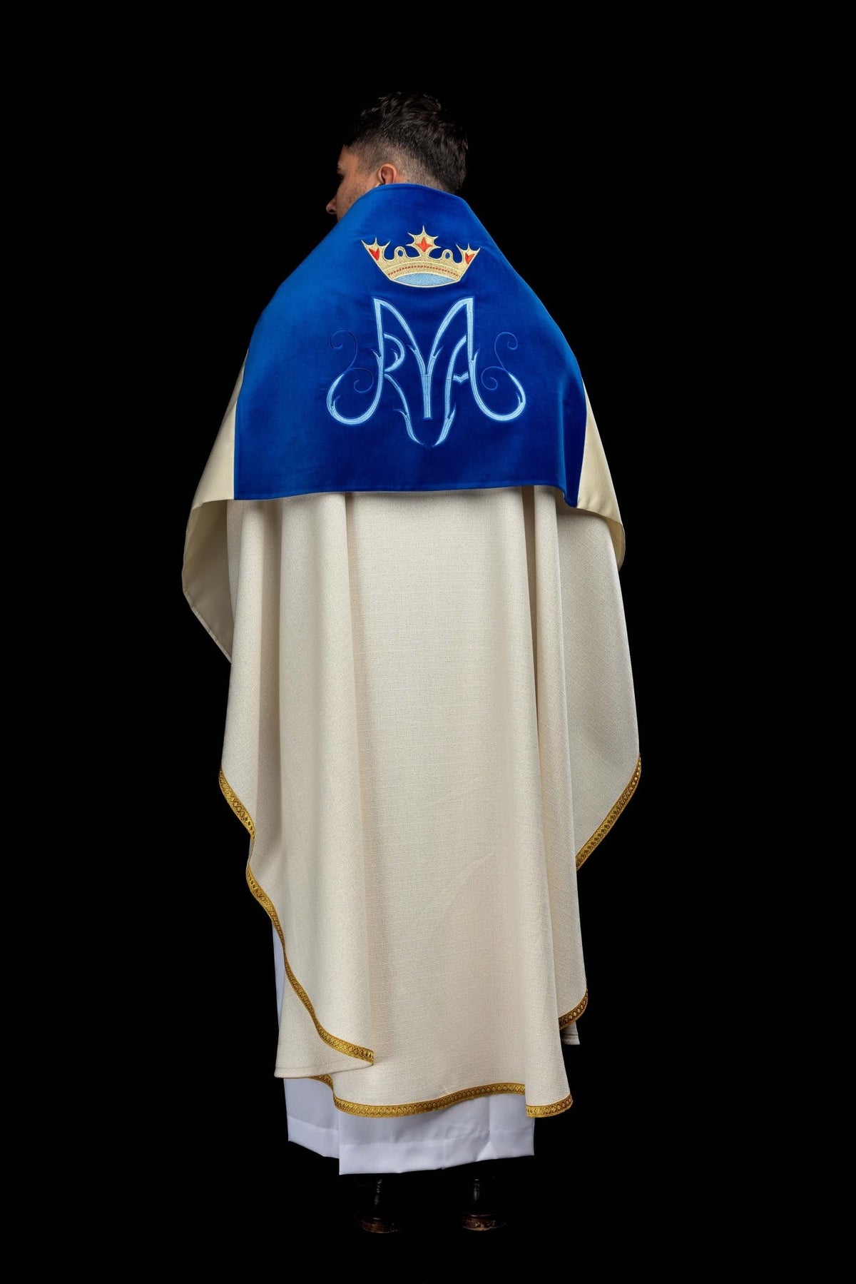 Back view of a humeral veil with blue velvet panel, Marian monogram and crown embroidery