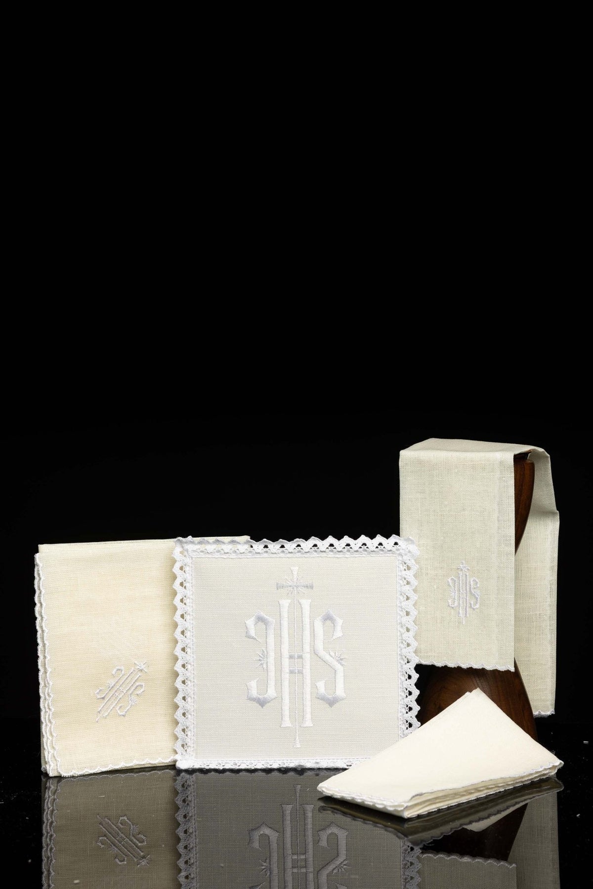 Front view of Embroidered altar linen IHS White set with lace trim and IHS embroidery