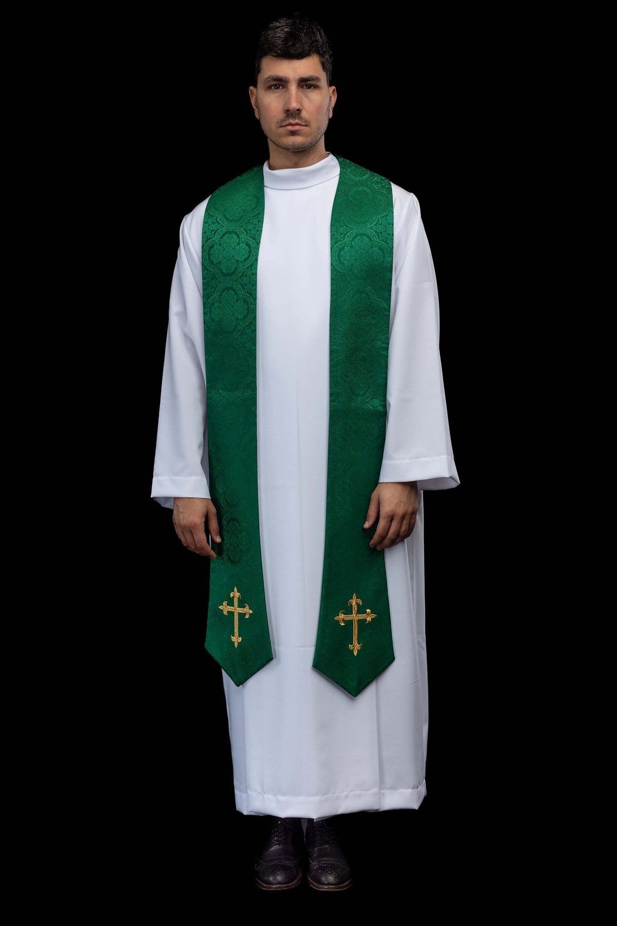 Full front view of the green stole with gold cross embroidery