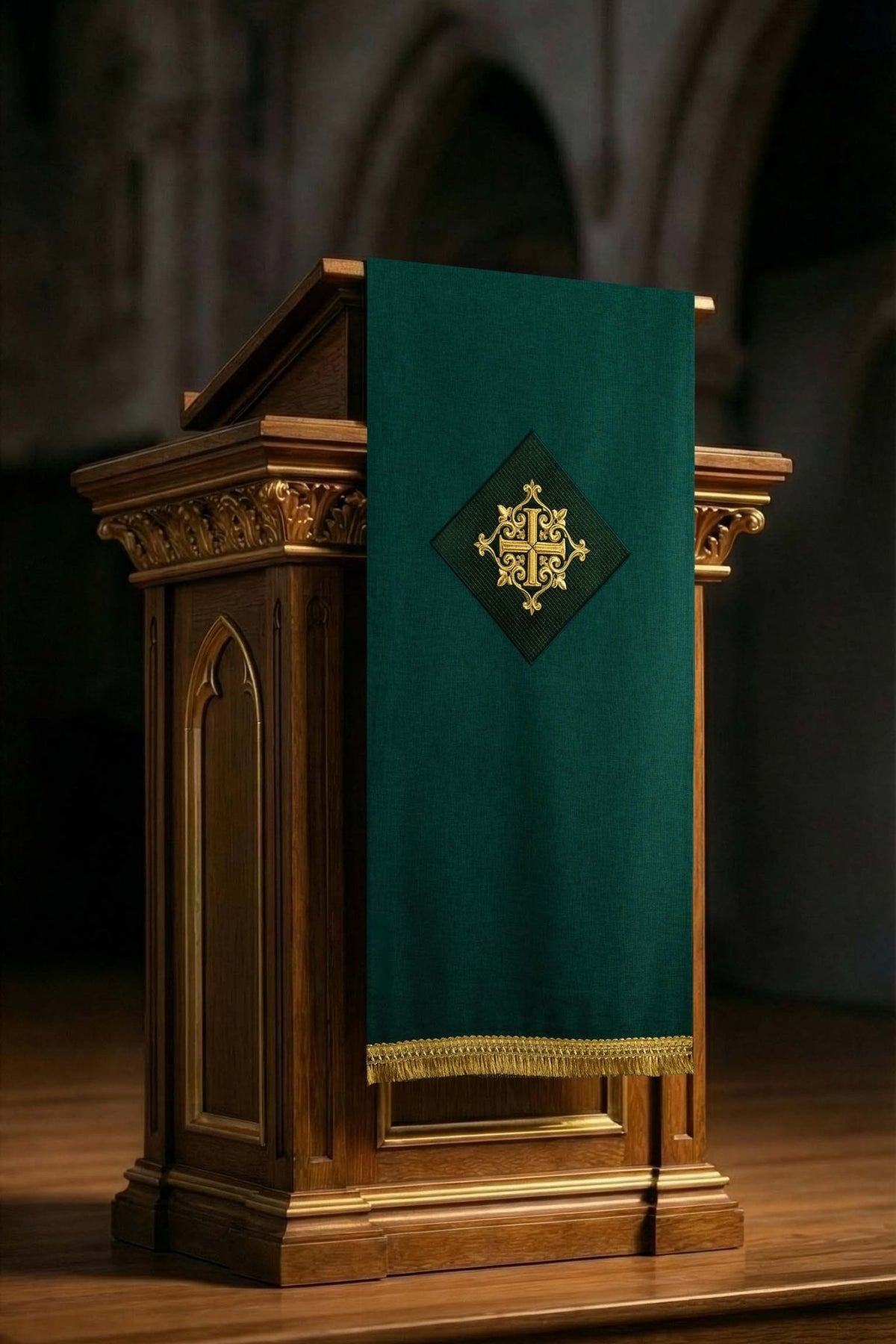 Front view of a Green Lectern Cloth with Embroidered Cross Motif, showing gold fringe and cross