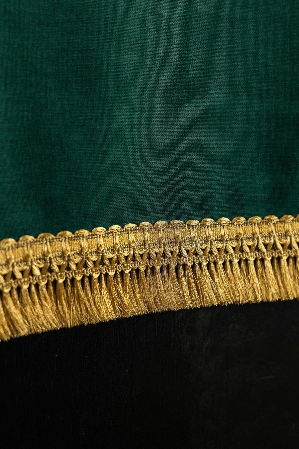 Close-up of the lectern cloth showing its decorative gold fringe