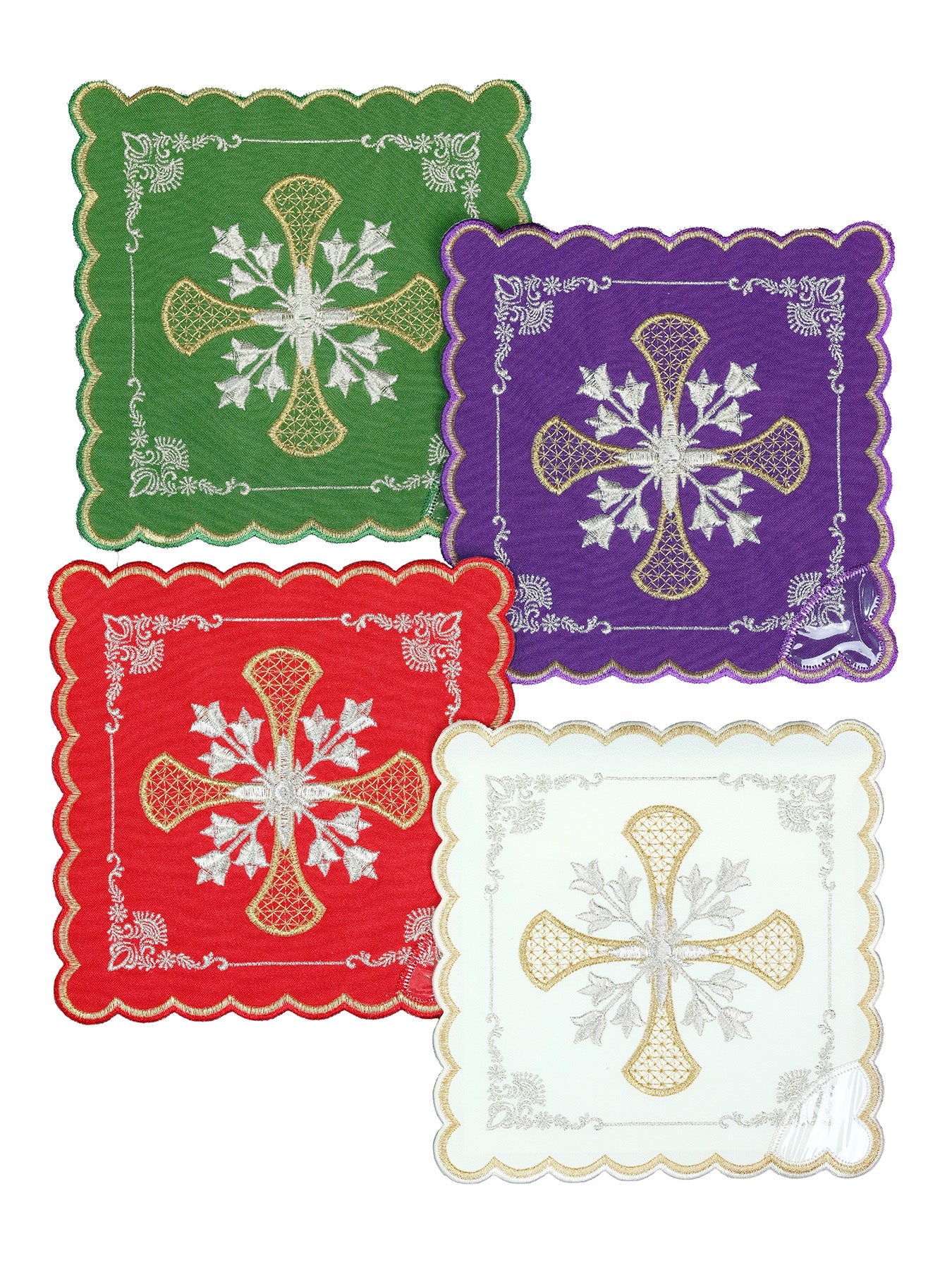 Set of chalice palls with a cross symbol in four liturgical colors