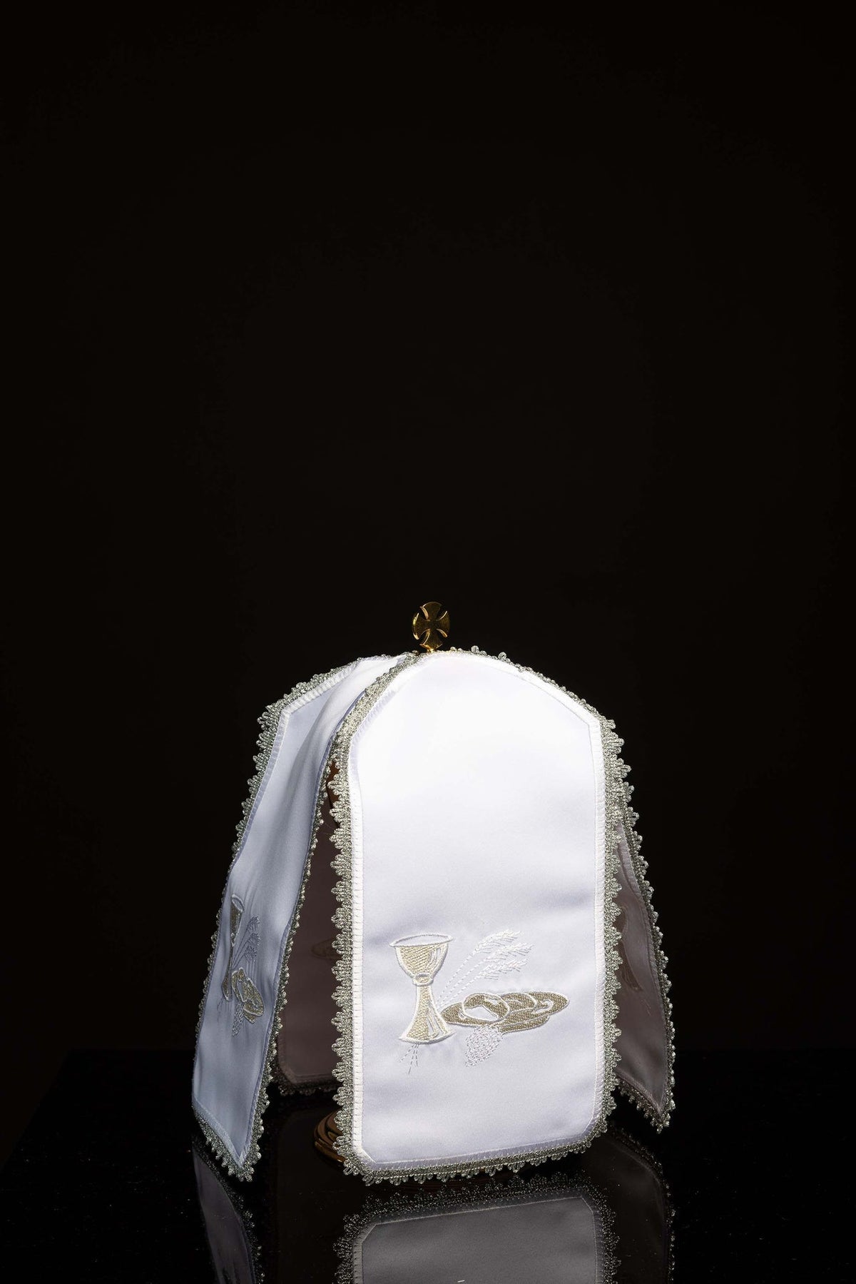 Front view of the Ciborium Veil Decorated with Silver Eucharistic Embroidery, white with silver trim