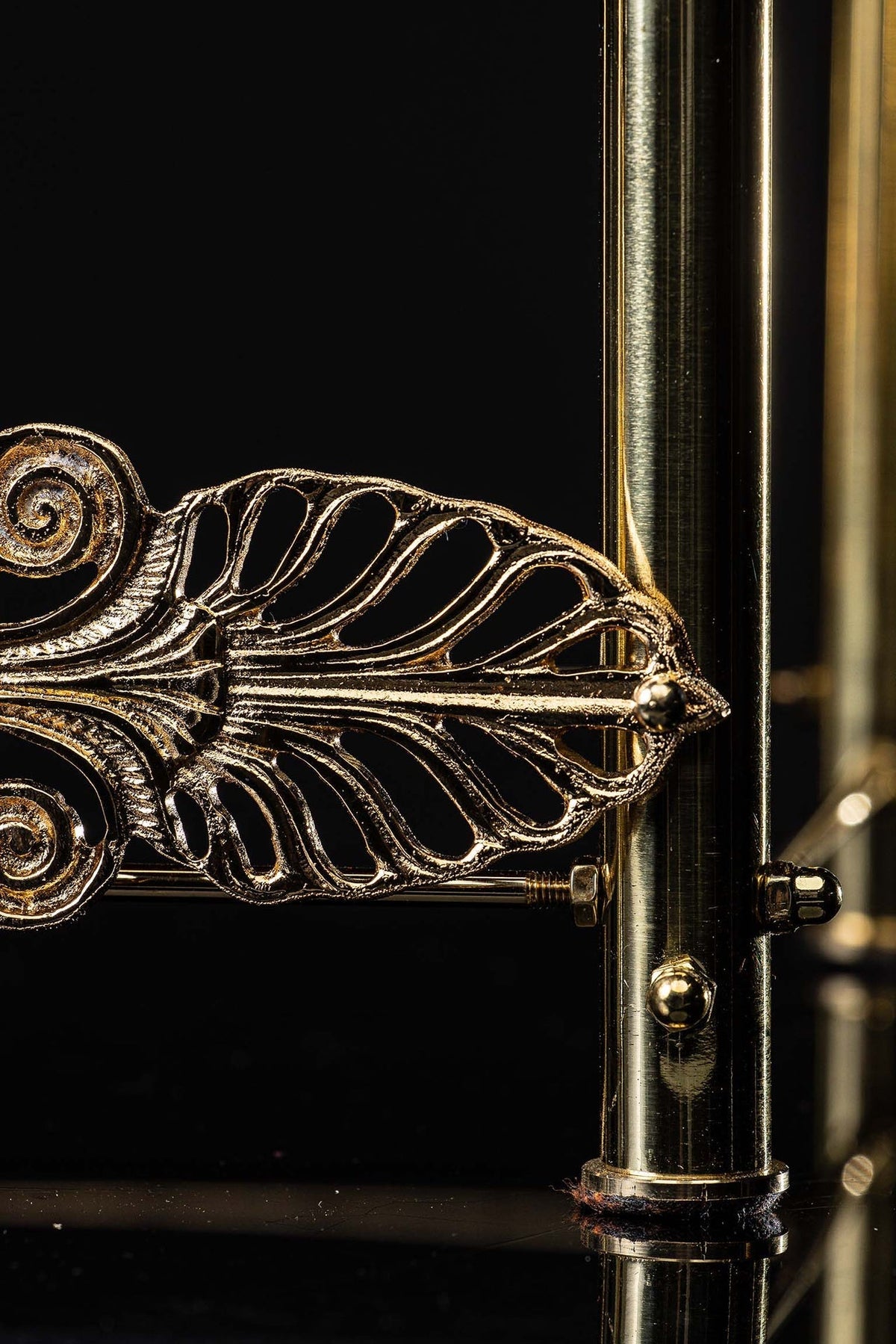 Close-up of the monstrance throne showing radiant rays and gilded Christ figure