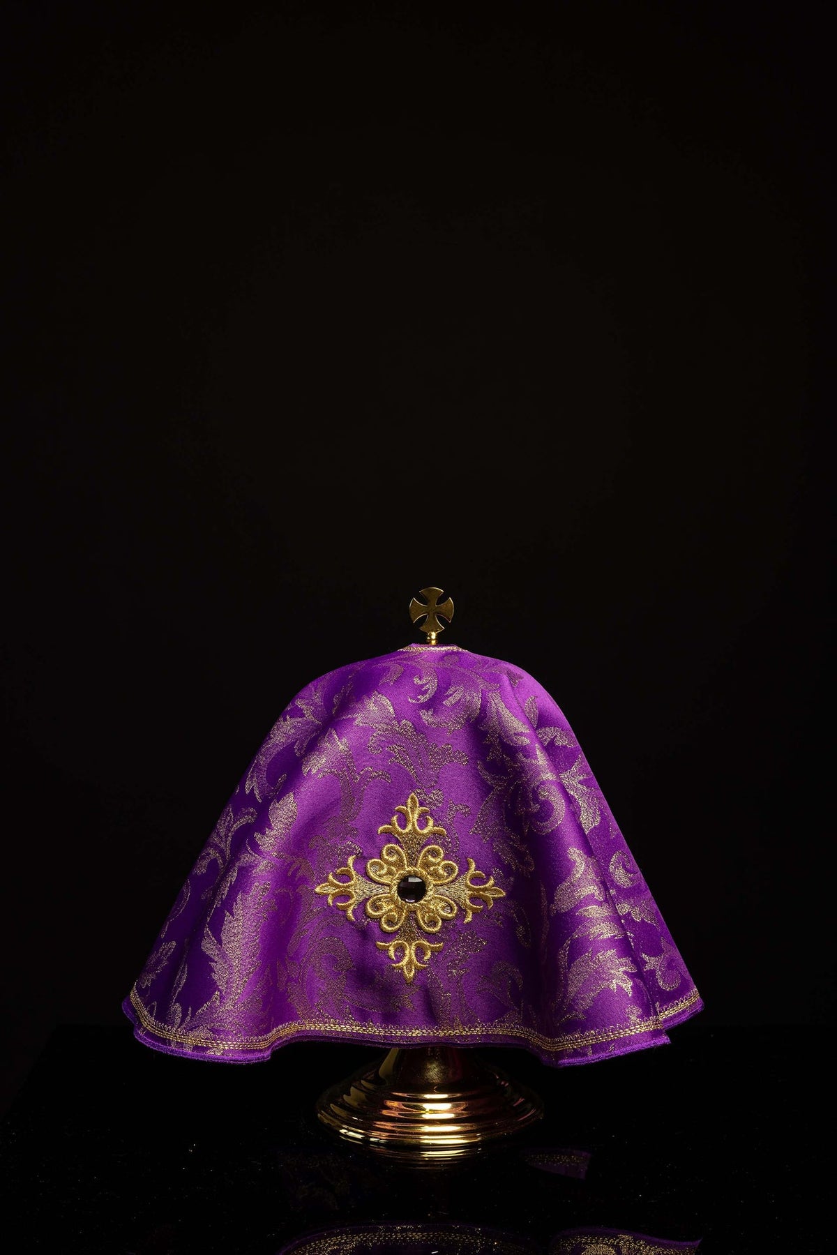 Front view of Purple Ciborium Veil Embroidered with a Cross and Set with a Stone