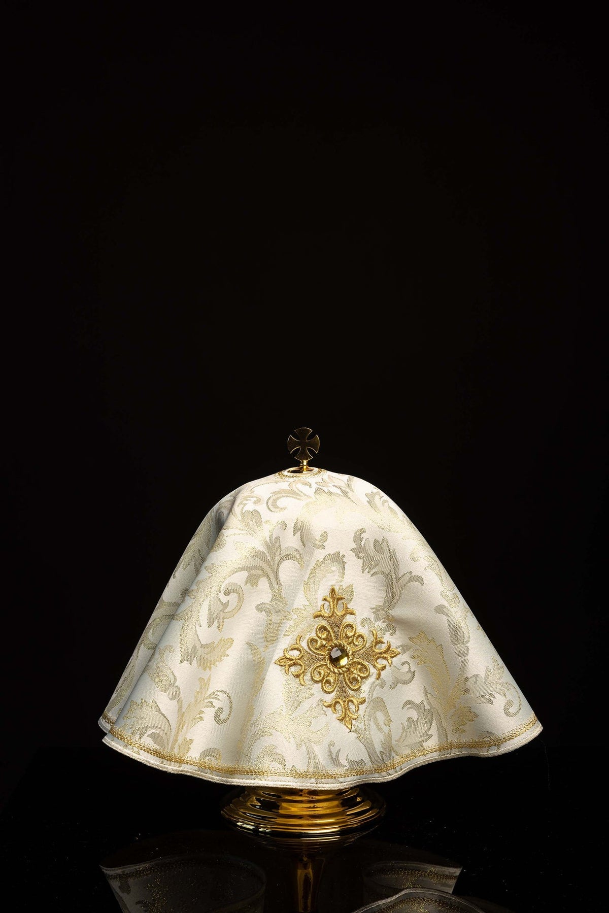 Front view of a Round Ciborium Veil Embroidered with a Cross and Decorative Stone in ecru