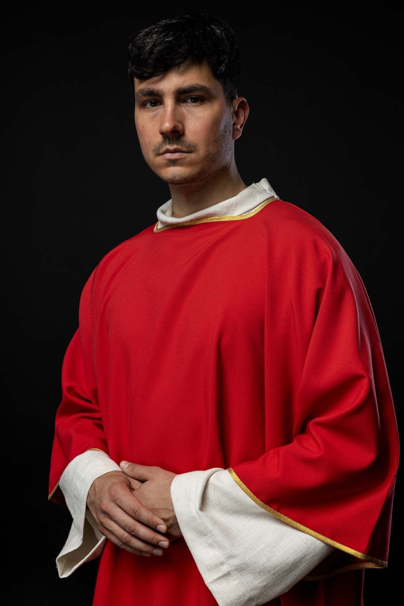 Plain dalmatic in red with gold trim KDL/1002/02/12/D - HAFTINAUSA.COM