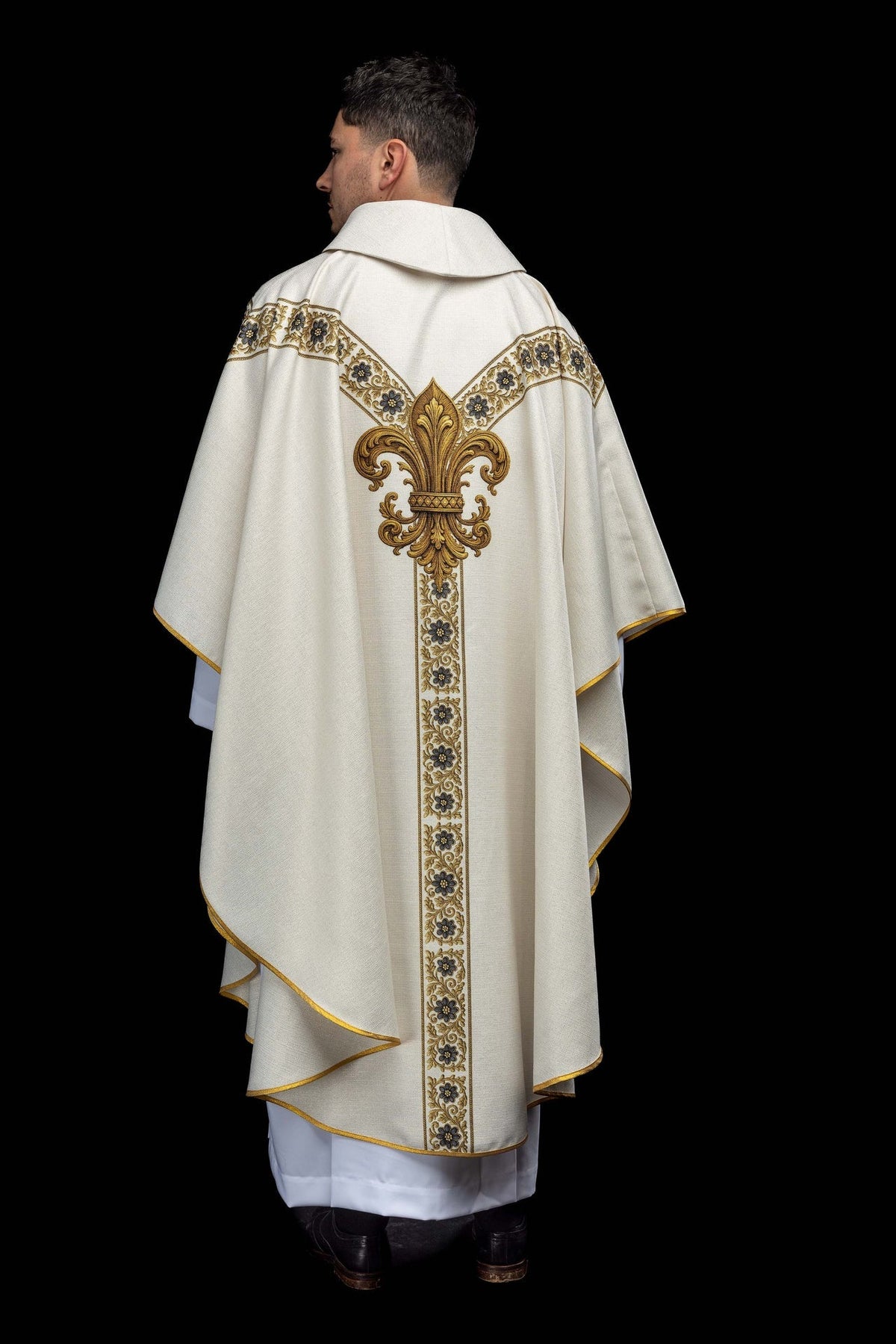 Back view of the printed chasuble with the image of the Immaculate Conception, showing gold floral bands and fleur-de-lis