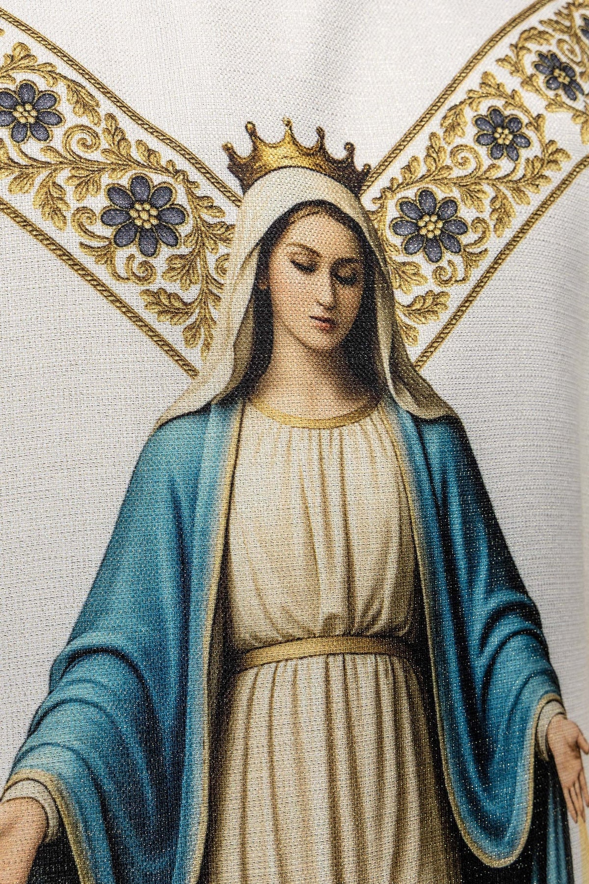 Close-up of the Immaculate Conception image on the ecru chasuble